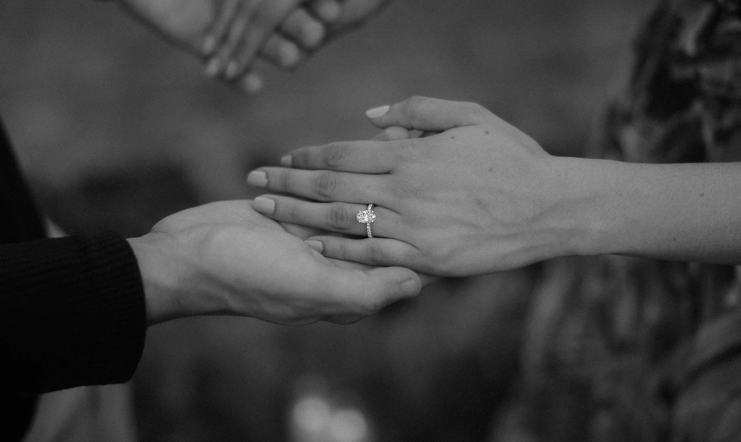 Black and white editorial portrait of a couple during an engagement session in Puerto Rico at Royal Isabela taken by a destination wedding photographer