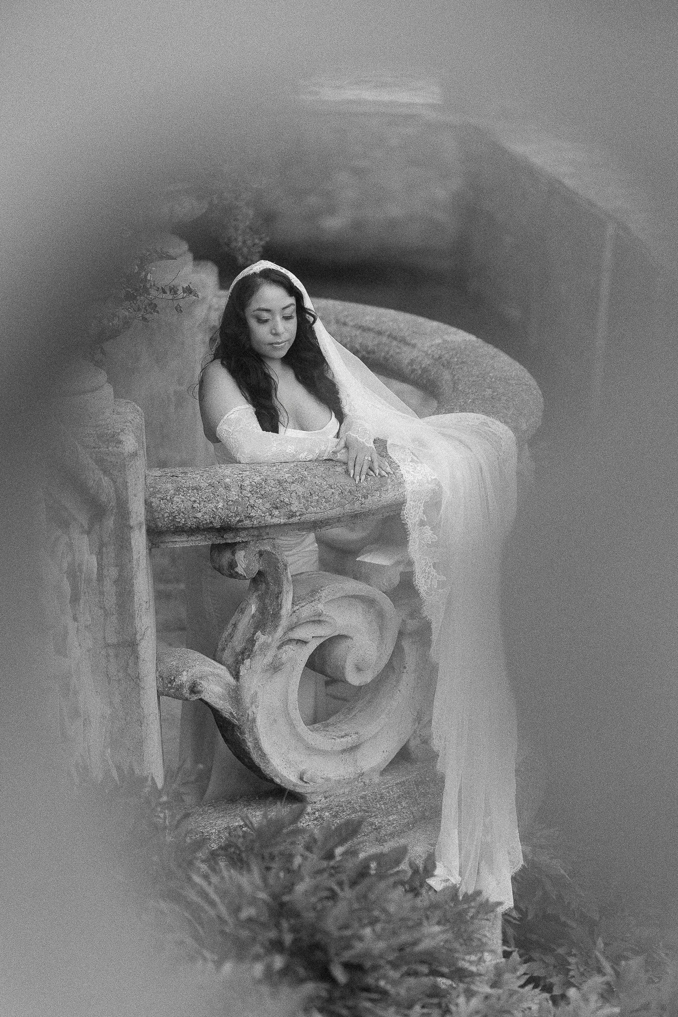 Black and white portrait of a bride during her luxury elopement at Villa del Balbianello in Lake Como taken by a destination wedding photographer in Italy