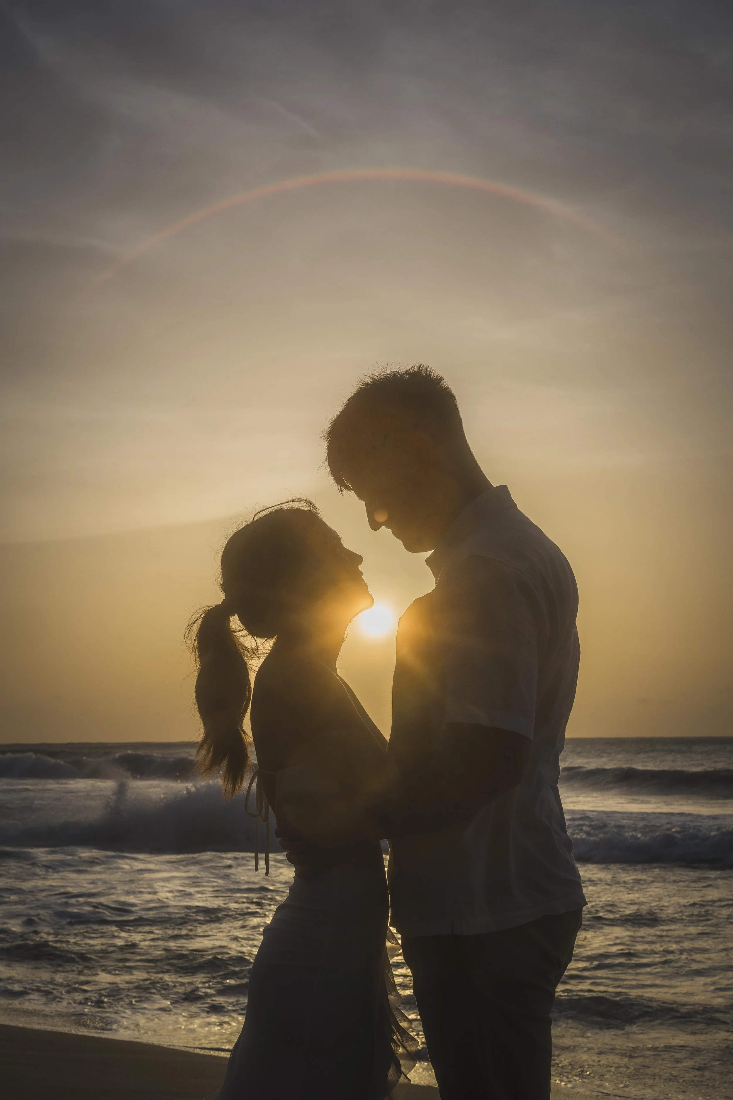 Silhouette of a couple at Punta Borinquen Beach in Aguadilla, Puerto Rico taken by an elopement photographer