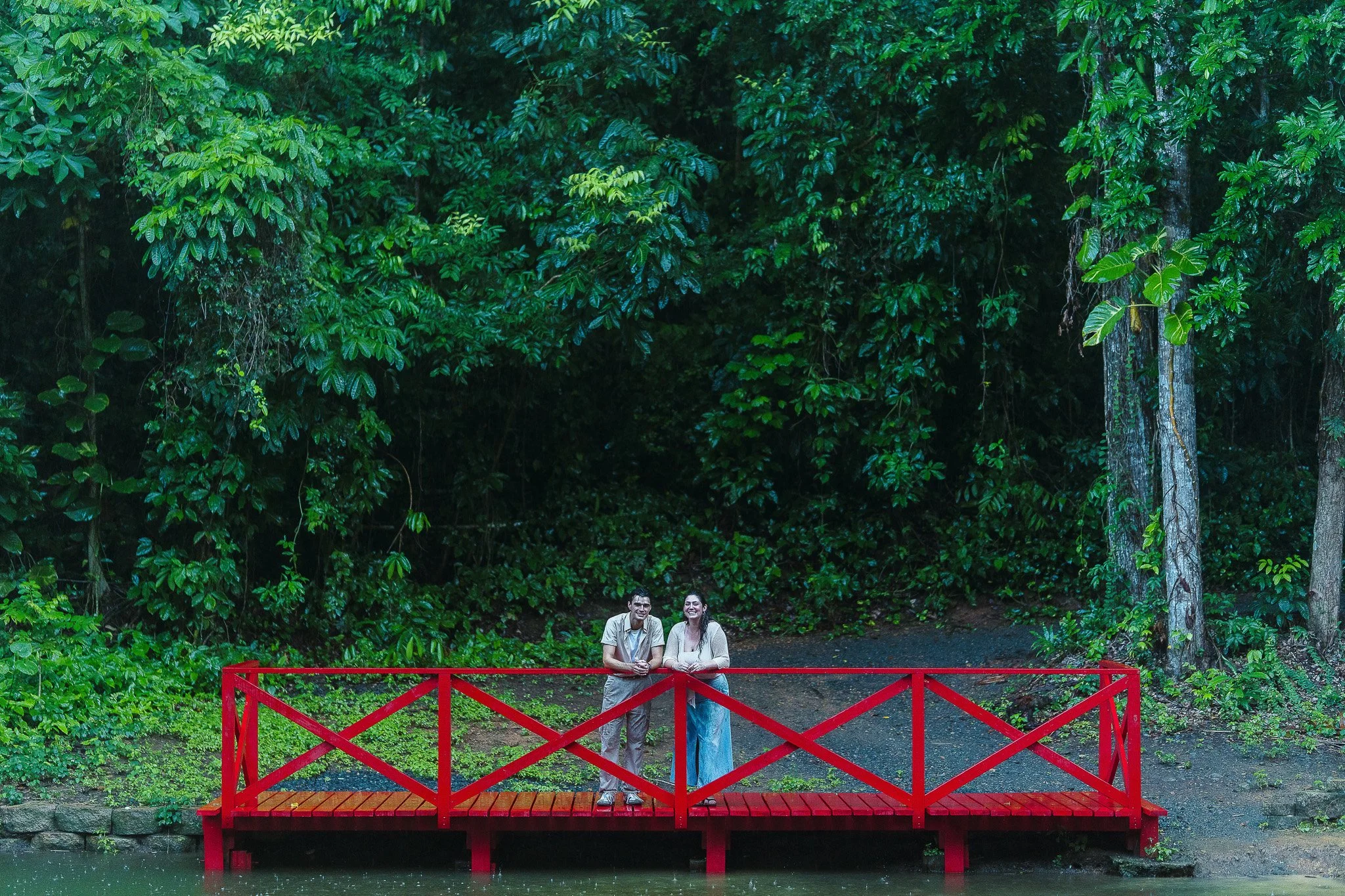 Couple embracing at Jardín Botánico at the University of Puerto Rico during the engagement session of their marriage proposal