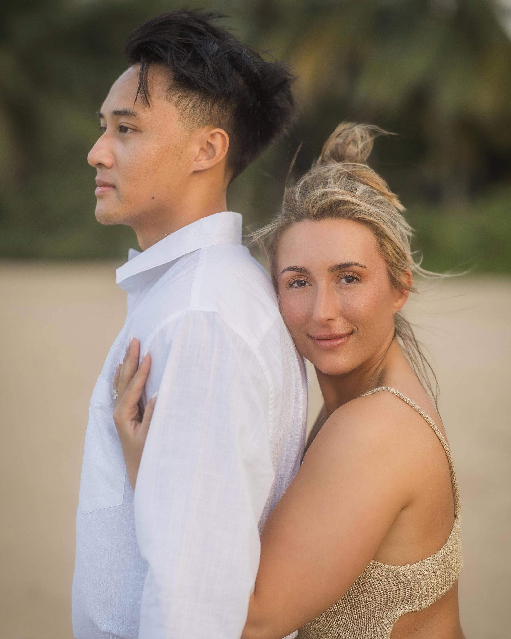 Couple embracing during a beach marriage proposal in Puerto Rico.