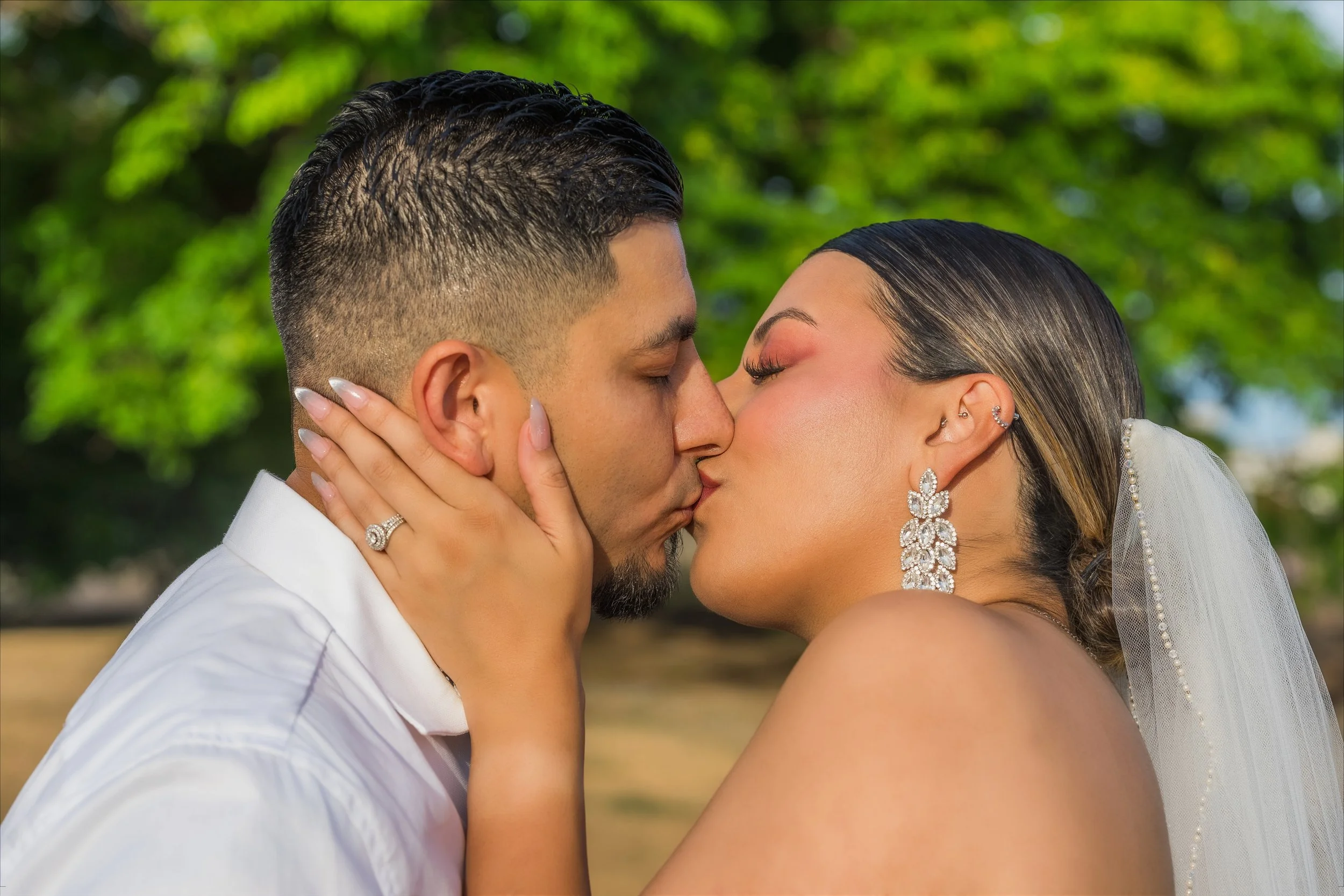 Bride and groom kissing in Old San Juan, Puerto Rico during their luxury elopement wedding ceremony.
