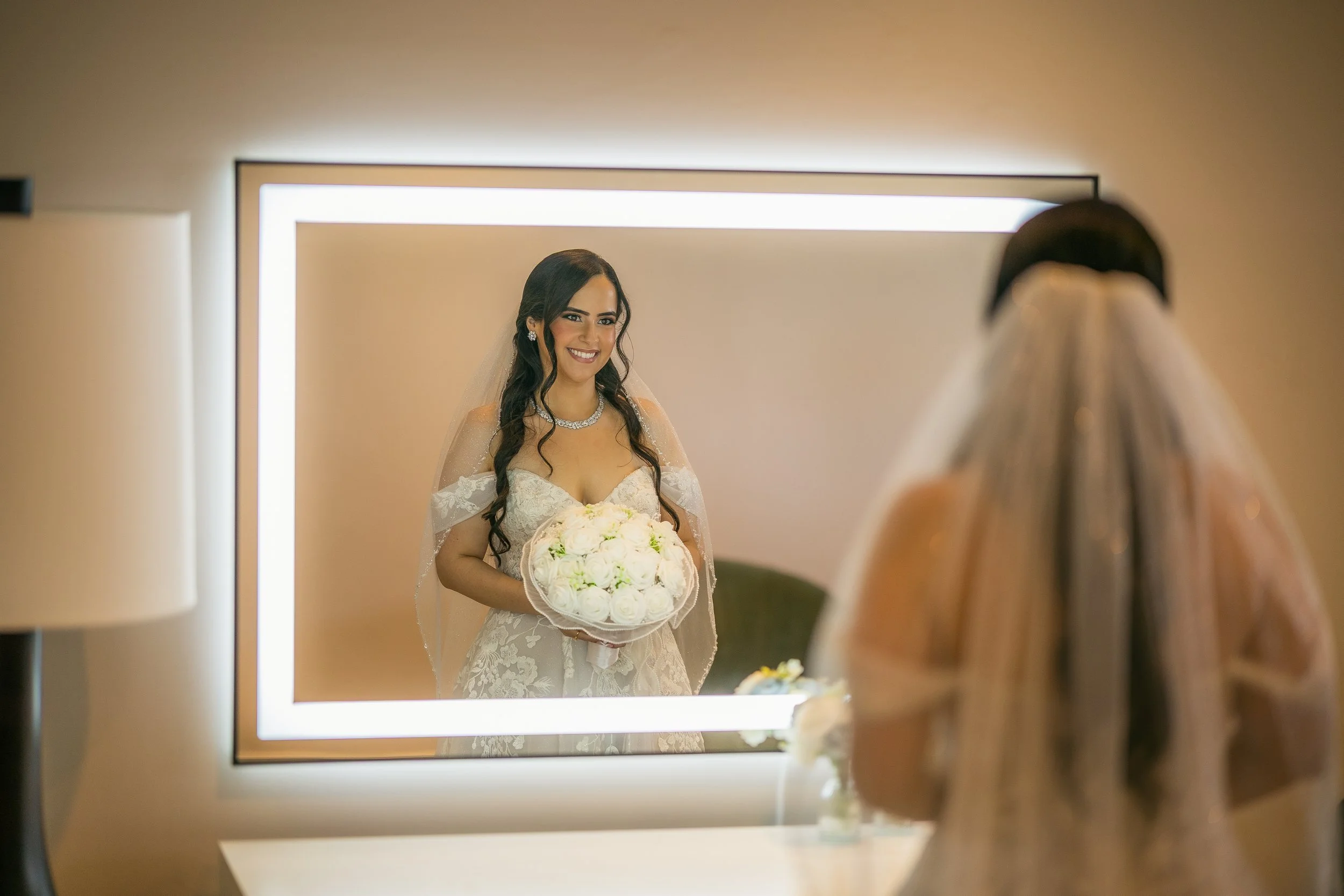 Mirror portrait of a bride during a luxury wedding in South Florida