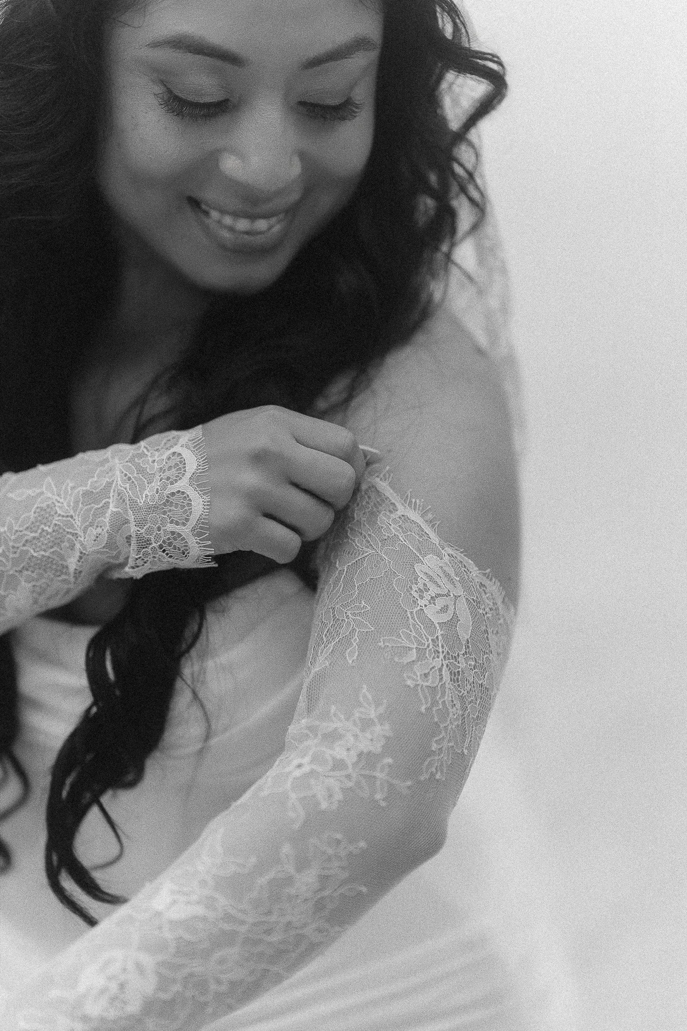 Black and white portrait of a bride during her luxury elopement at Villa del Balbianello in Lake Como taken by a destination wedding photographer in Italy