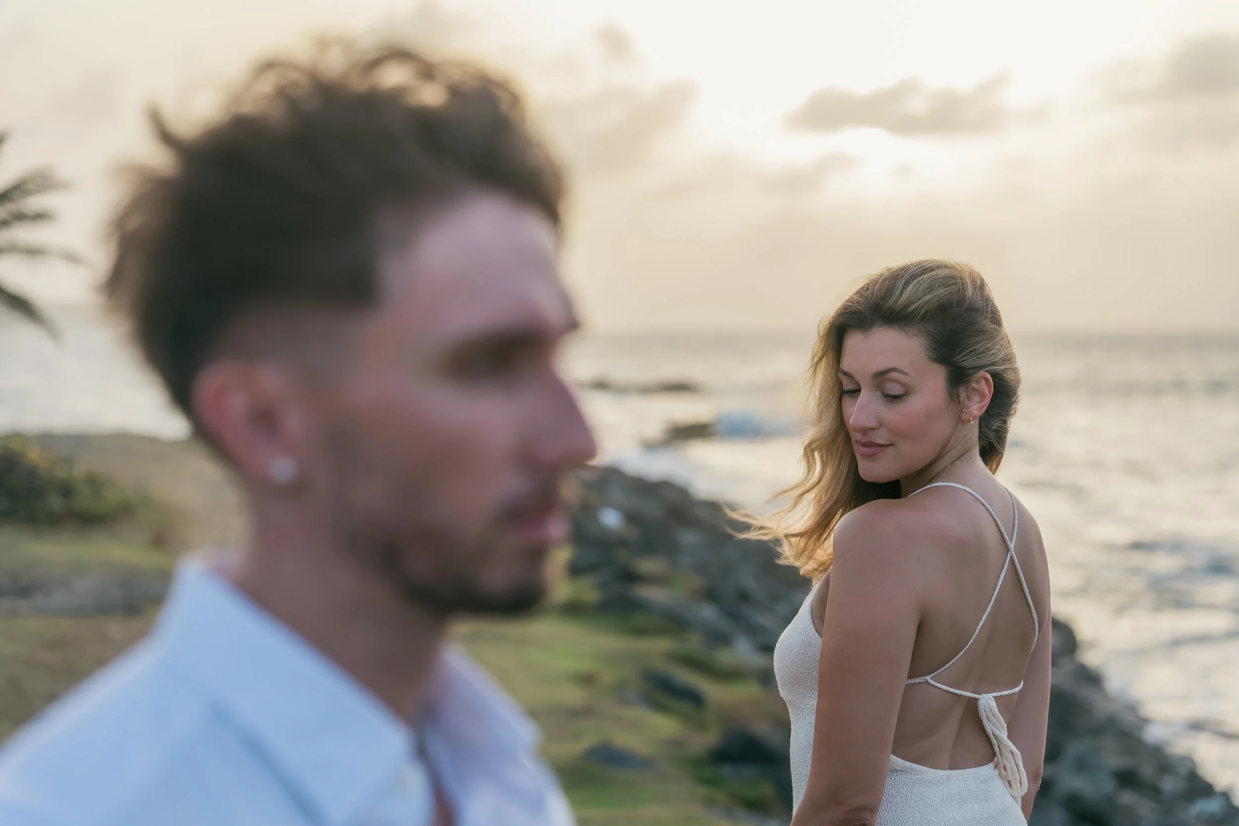 Editorial portrait of a couple at Escambrón Beach during their engagement session in Puerto Rico