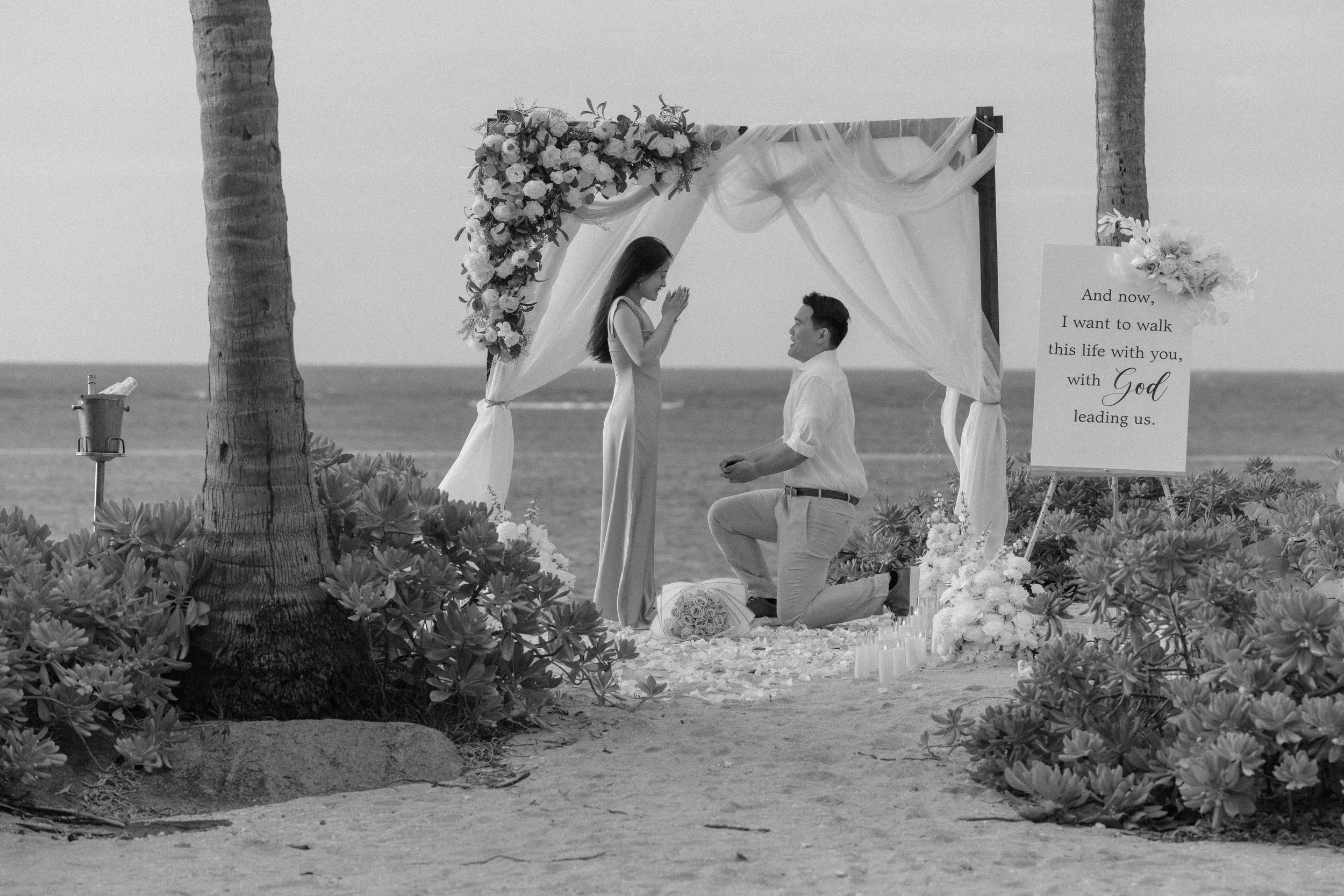 Man proposing to woman at the Hyatt Regency Grand Reserve in Puerto Rico shot by a wedding photographer
