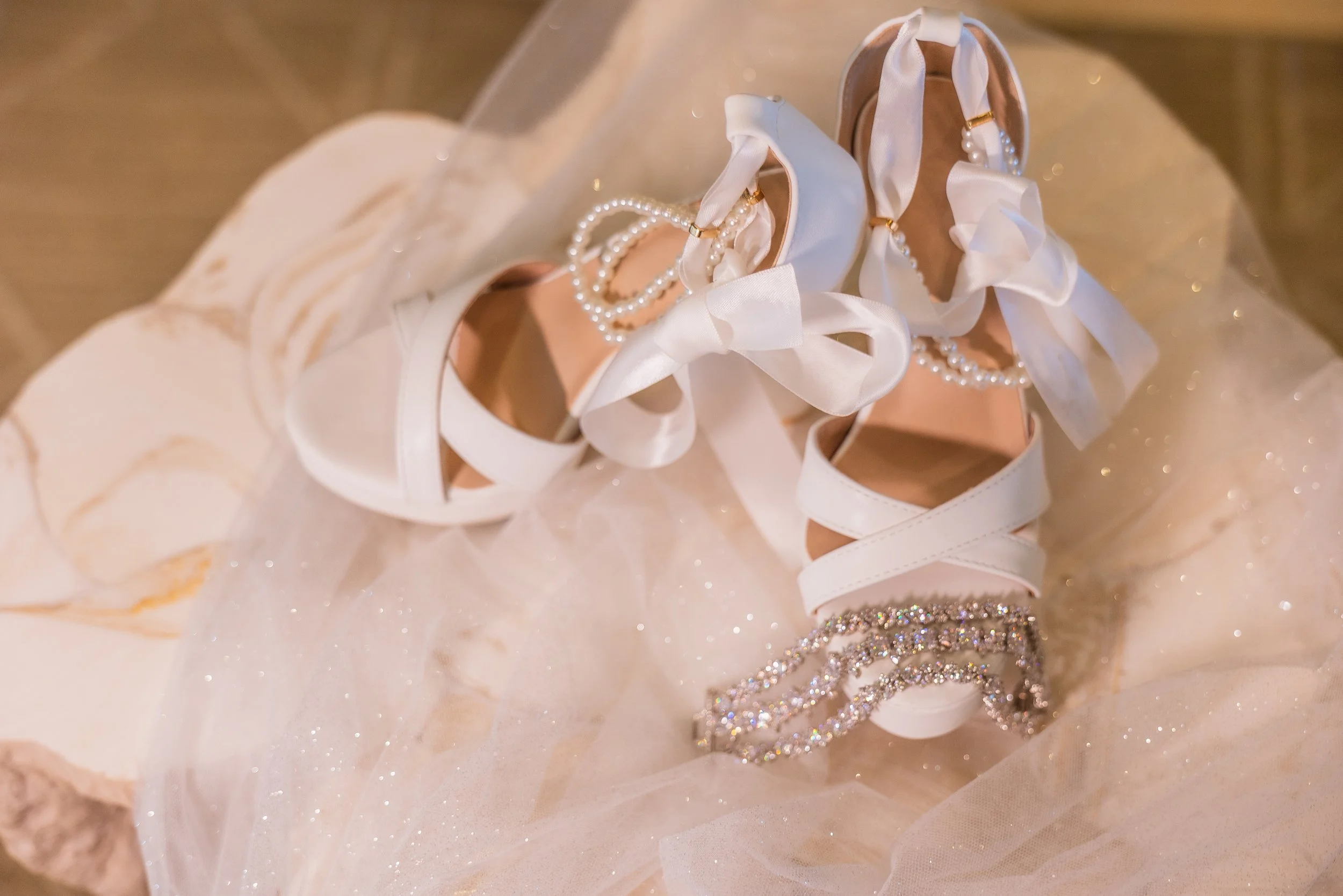 Bride's details on a table shot by a luxury wedding photographer in Central Florida at Indian Spring Country Club in Boynton Beach.