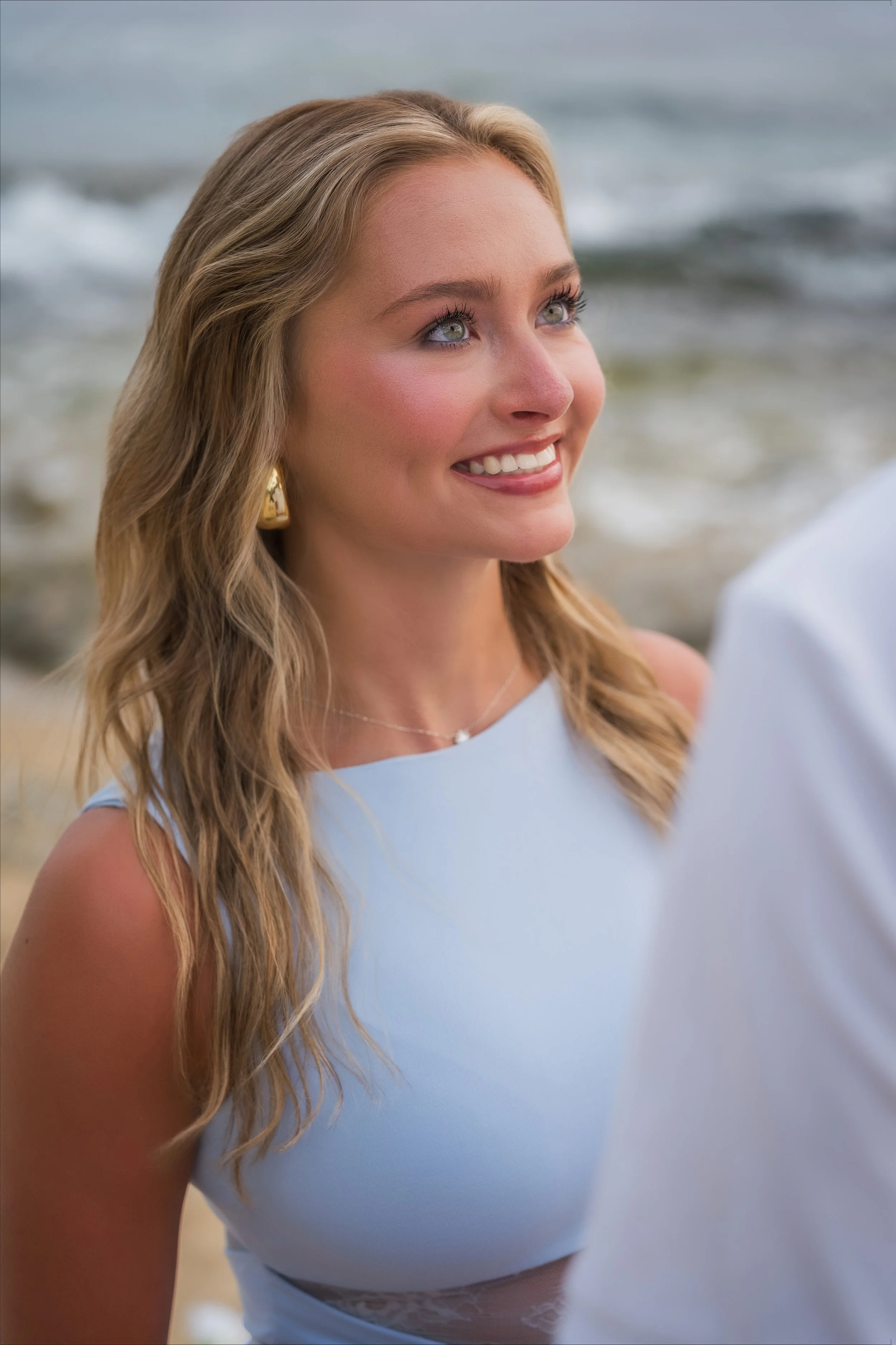 Woman smiling during her engagement session in Rincón after her surprise marriage proposal in Puerto Rico