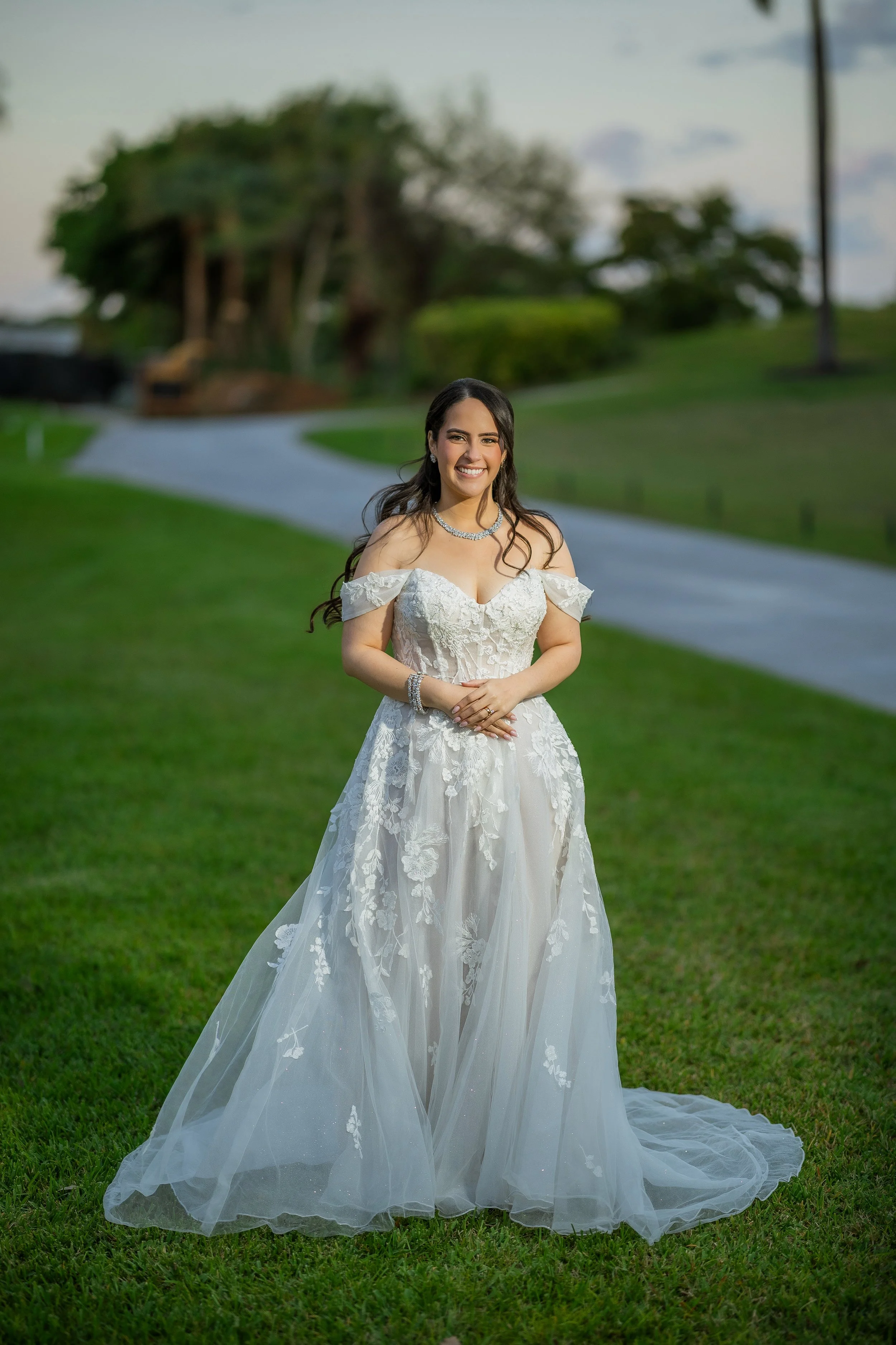 Bride on the lawn of the Indian Spring Country Club during her luxury wedding in Boynton Beach, Florida