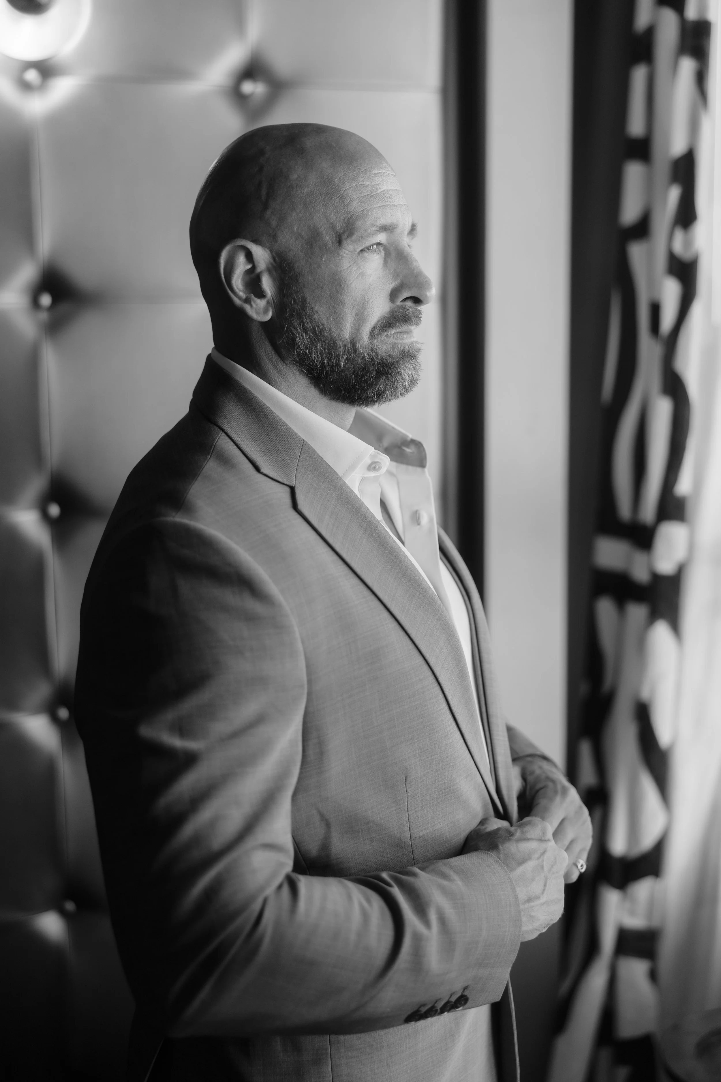 Groom getting ready at El Conquistador Resort prior to his ceremony taken by a luxury wedding photographer in Puerto Rico