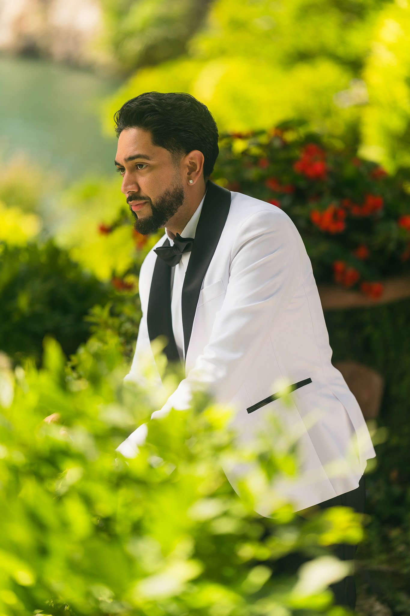 Editorial portrait of a groom at Villa del Balbianello taken by a destination wedding photographer during his luxury elopement in Lake Como