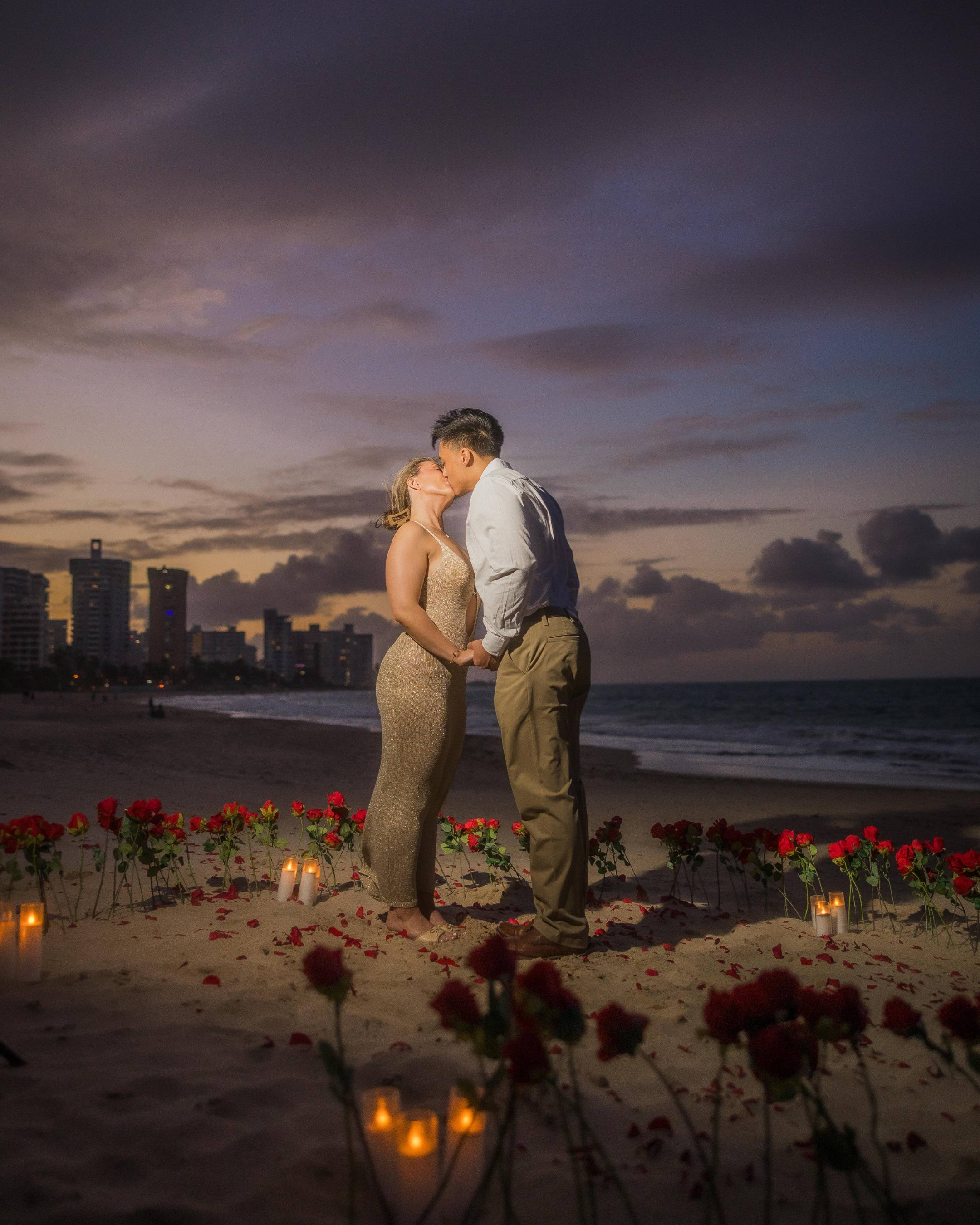 Couple kissing during a marriage proposal in Puerto Rico