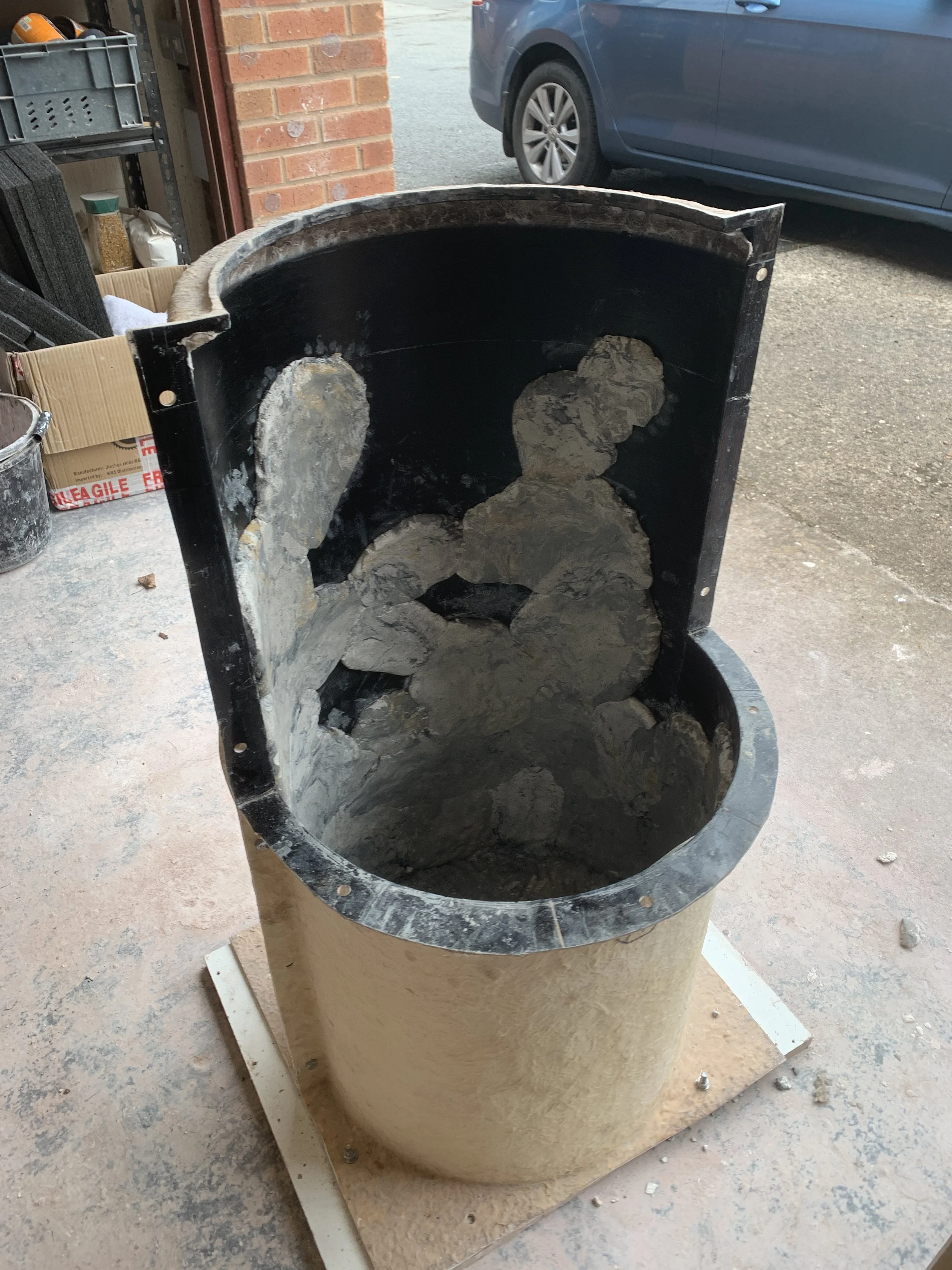 Applying scagliola to inside of mould
