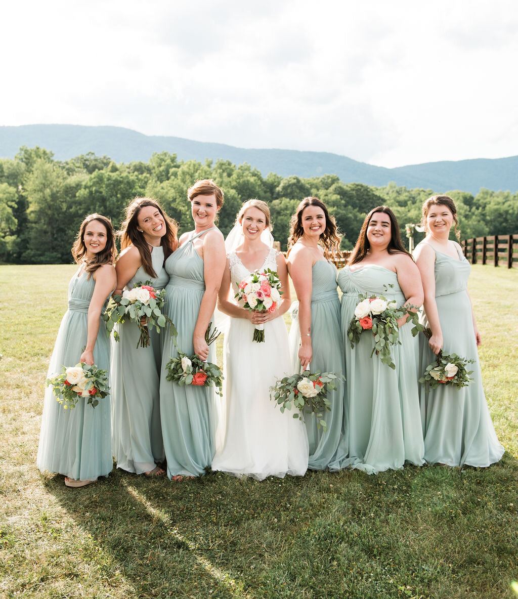 bridesmaids in long sage dresses