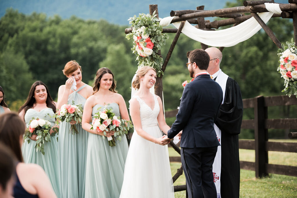 wedding ceremony, bride looking lovingly at groom