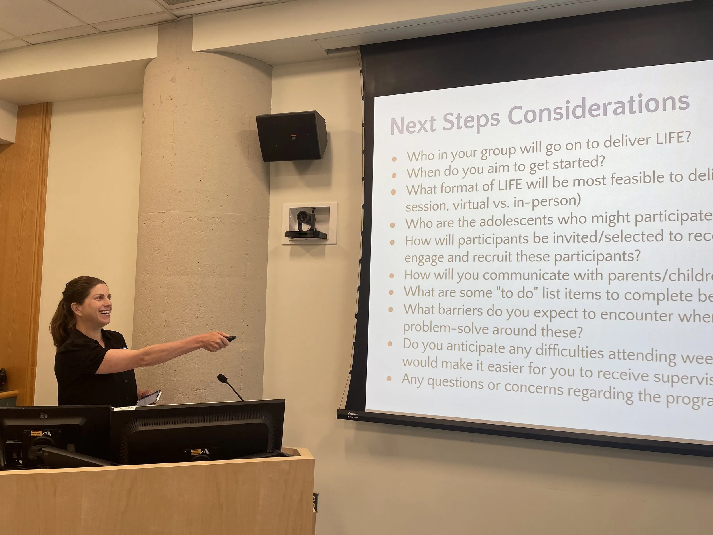 Dr. Annie Burke leading a training for the Living In Families with Emotions (LIFE) program, equipping members of local communities with the knowledge and skills to teach resilience-boosting skills to adolescents. 