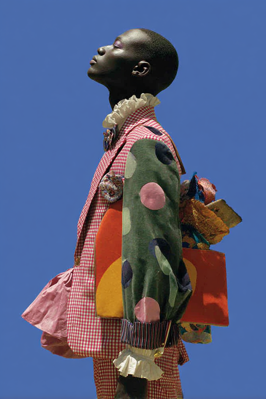 Baroque_elegance_african_Model_colors_complementary_suit_fold_b58acb94-5673-4cf7-9e93-56c29811b357_0.png