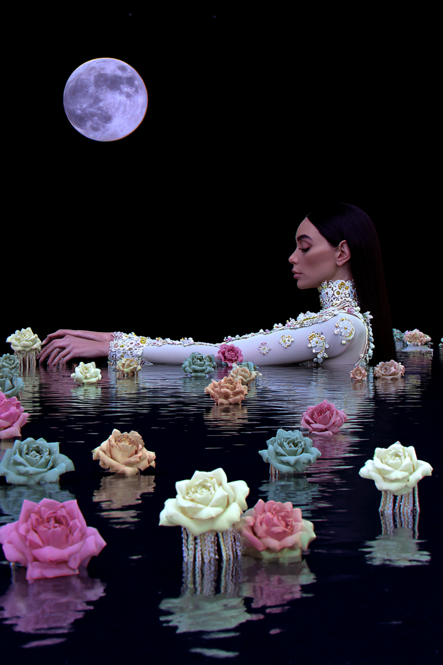 Model_floating_in_a_black_lake_wearing_a_translucent_couture__00701a36-1dbf-4b8f-af6c-1e788a390936_0.png