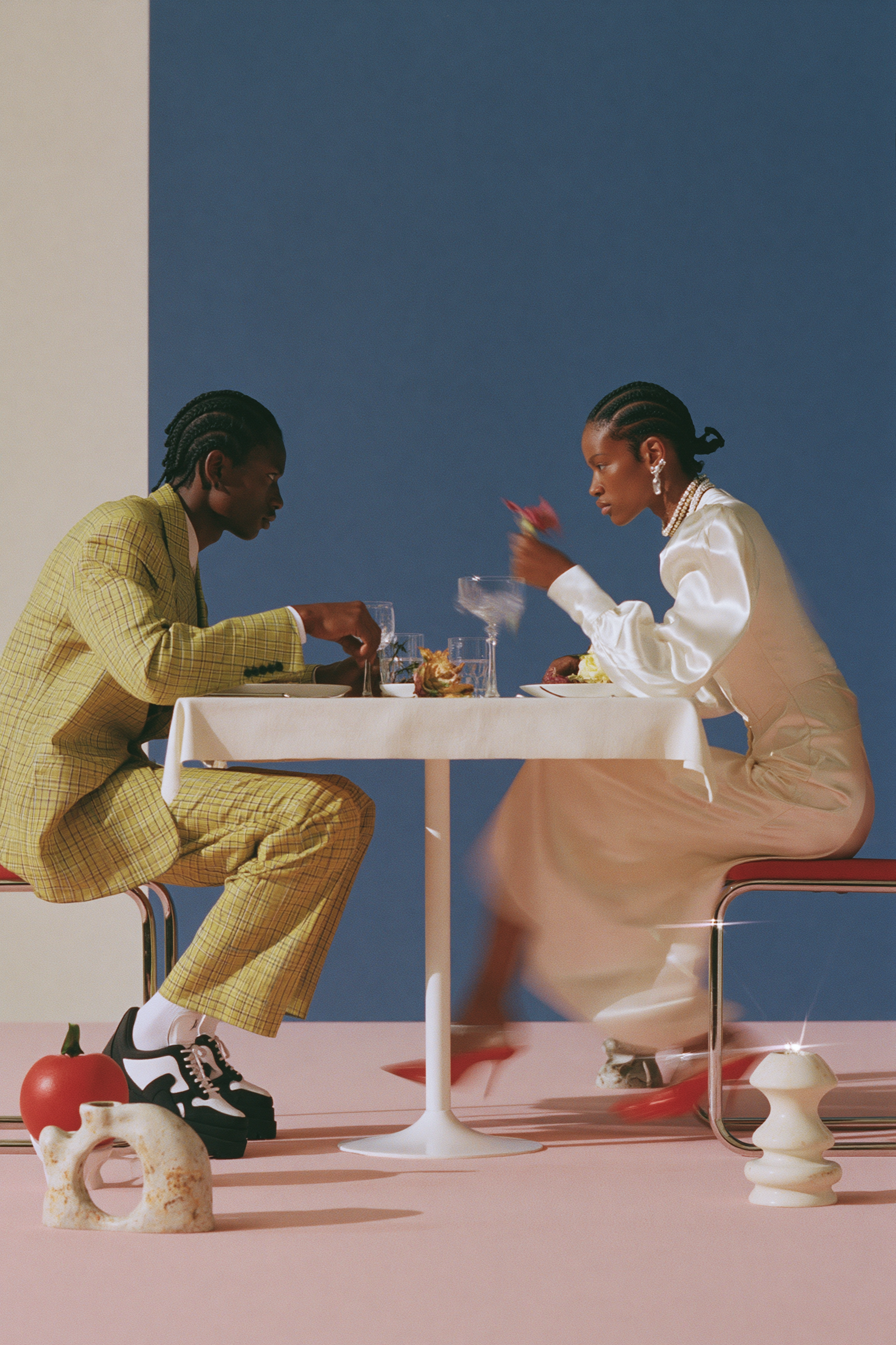 biggie_Black_African_male_and_female_models_sitting_at_a_dinn_dc82bff3-4cd0-425e-b9fa-b9173f6ce186_1.png