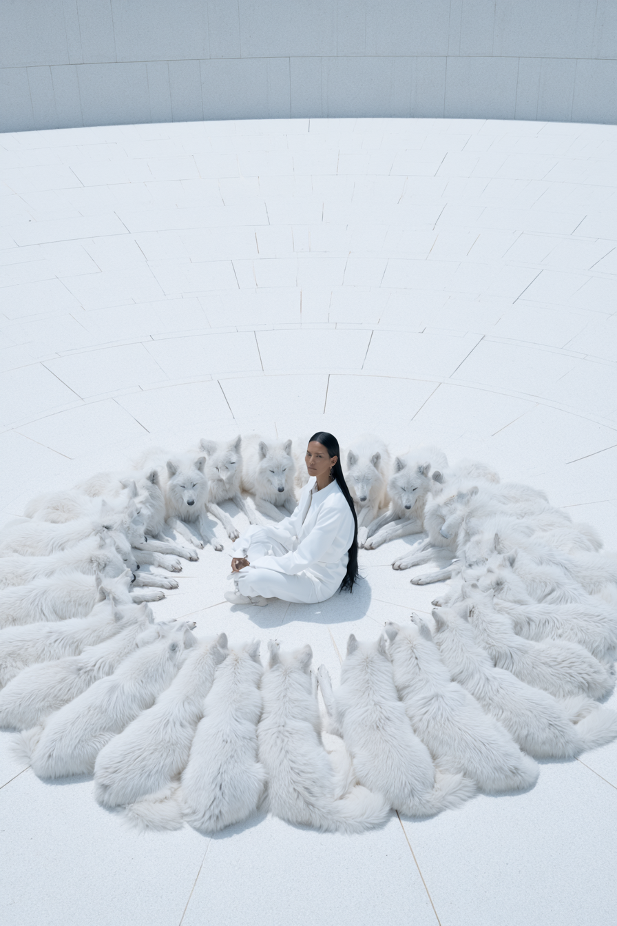 Fashion_female_model_seated_in_a_massive_stone_cathedral_with_0d713b7c-a2f5-442c-ba7e-eaa29985f859_3.png