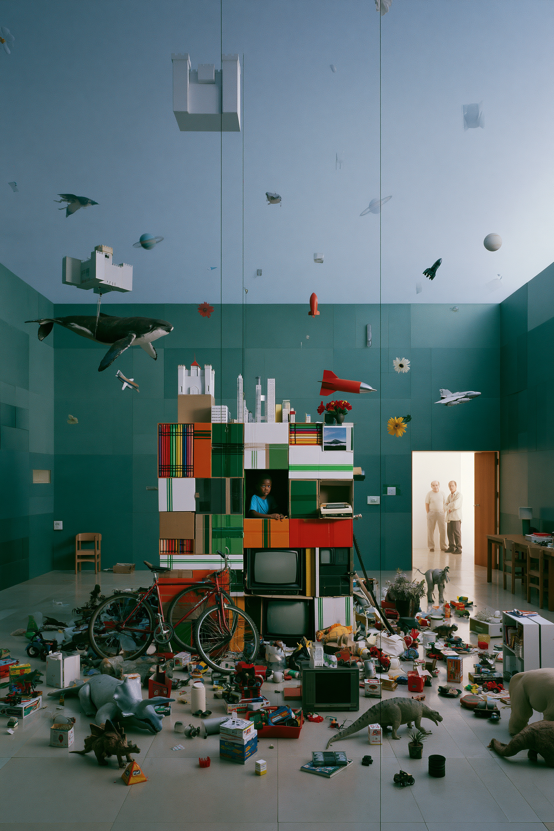 A_young_Black_child_sitting_inside_an_enormous_homemade_cardb_df7b2323-0ece-4342-87a8-f38439640b6c_0.png