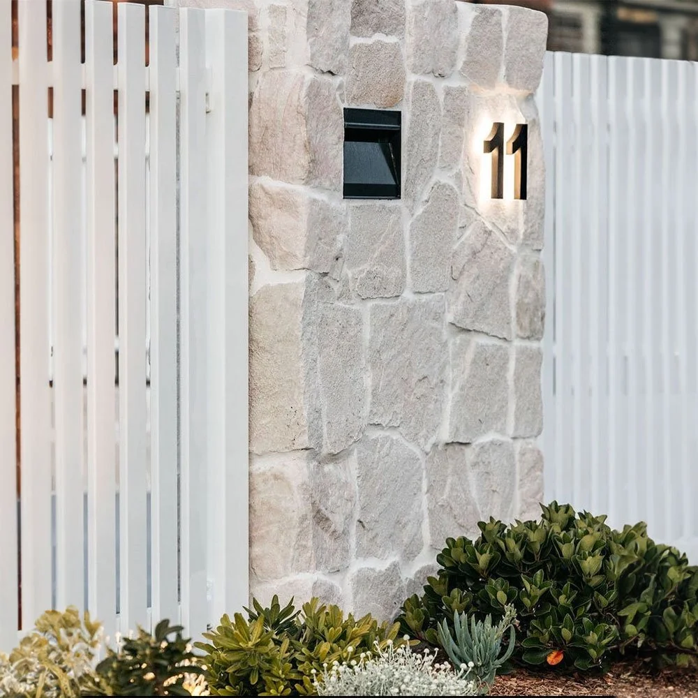 Backlit LED Illuminated House Numbers on stone letterbox pillar