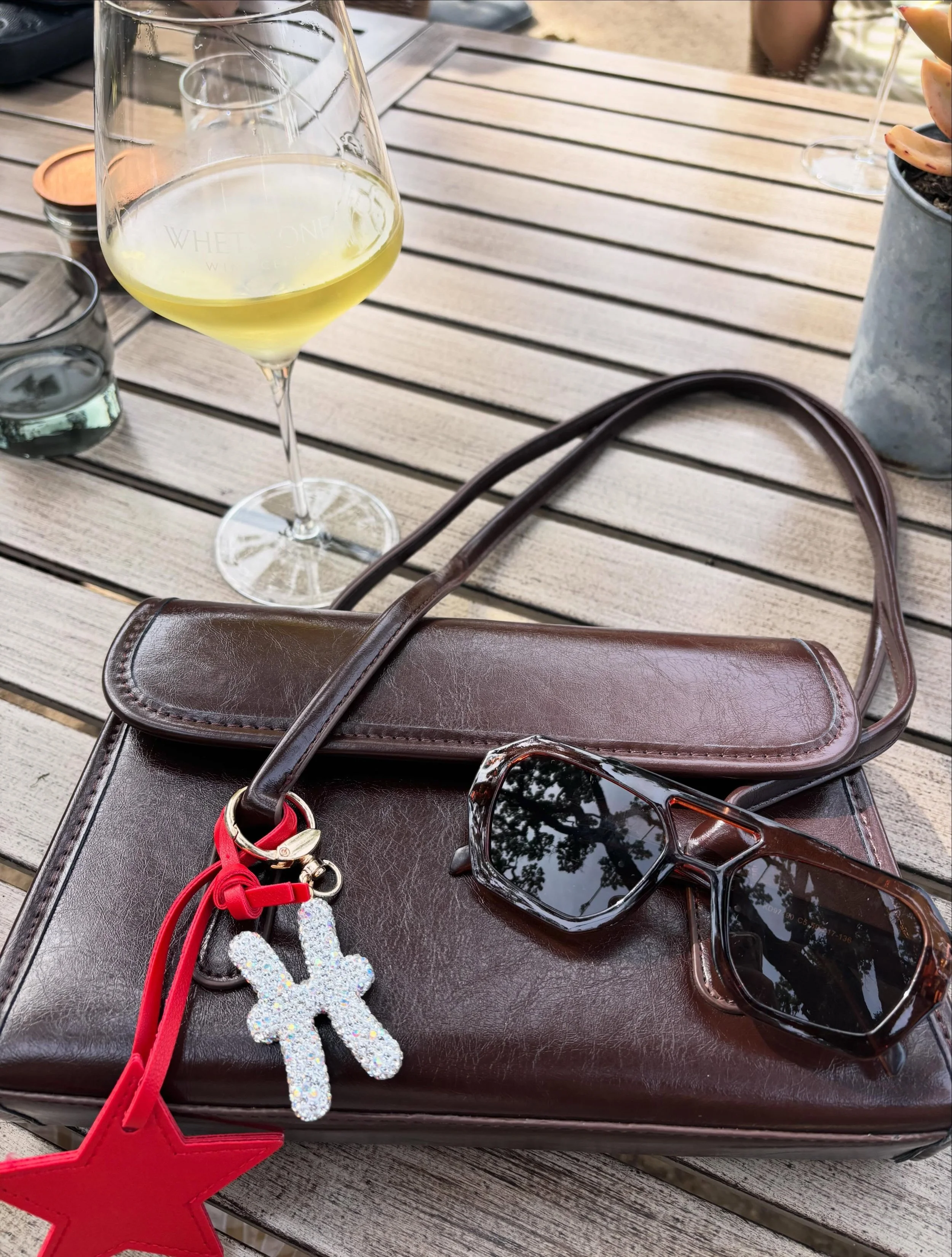 Accessories all @shopxochristy ✨

⭐️Gia Purse in Espresso
⭐️Skye Sunnies in Toffee 
⭐️Zodiac Bag Charm
⭐️Star Bag Charm