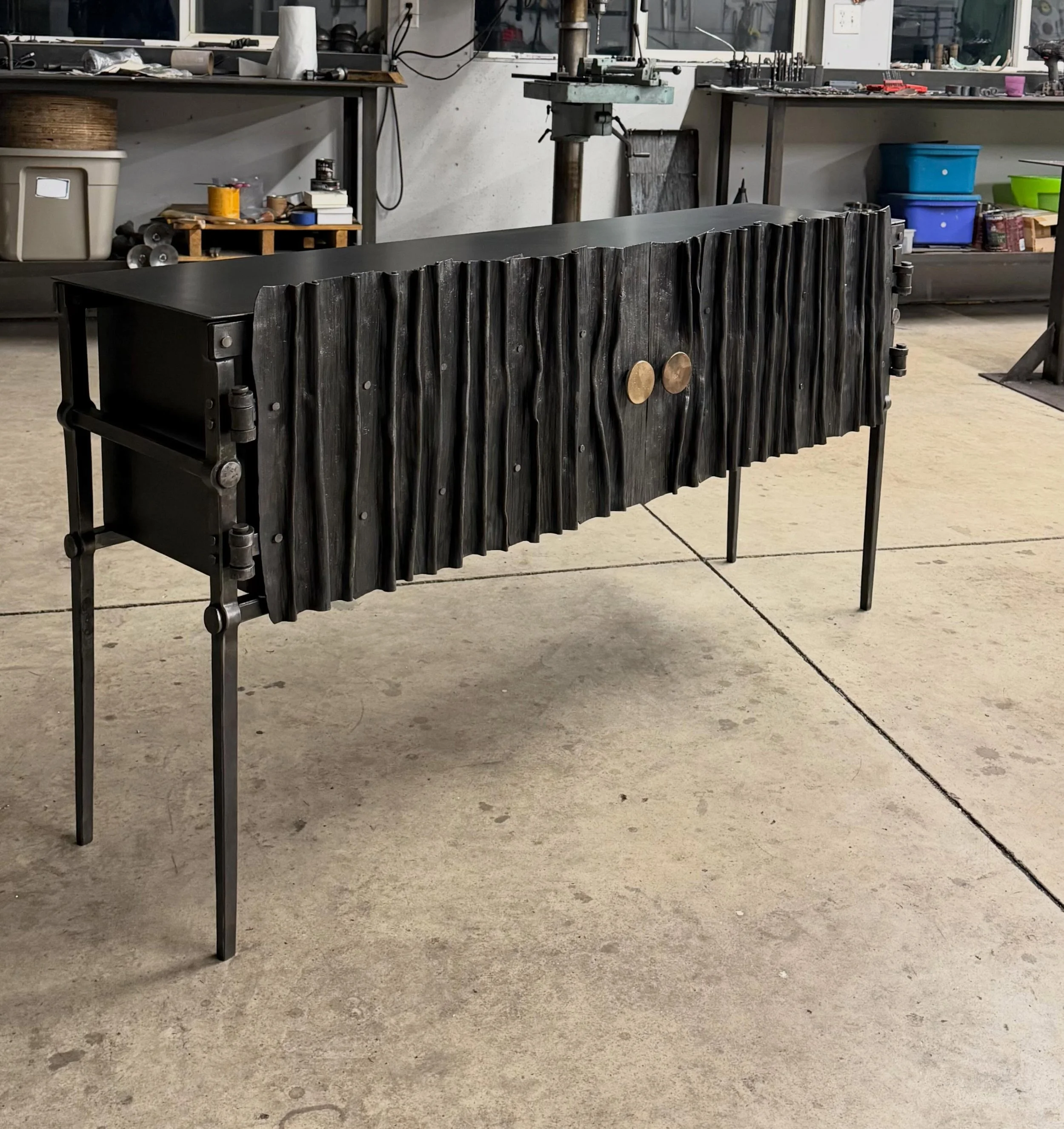 Custom piece that left the studio this week. #blacksmith #handmade #forgedfurniture #cabinets