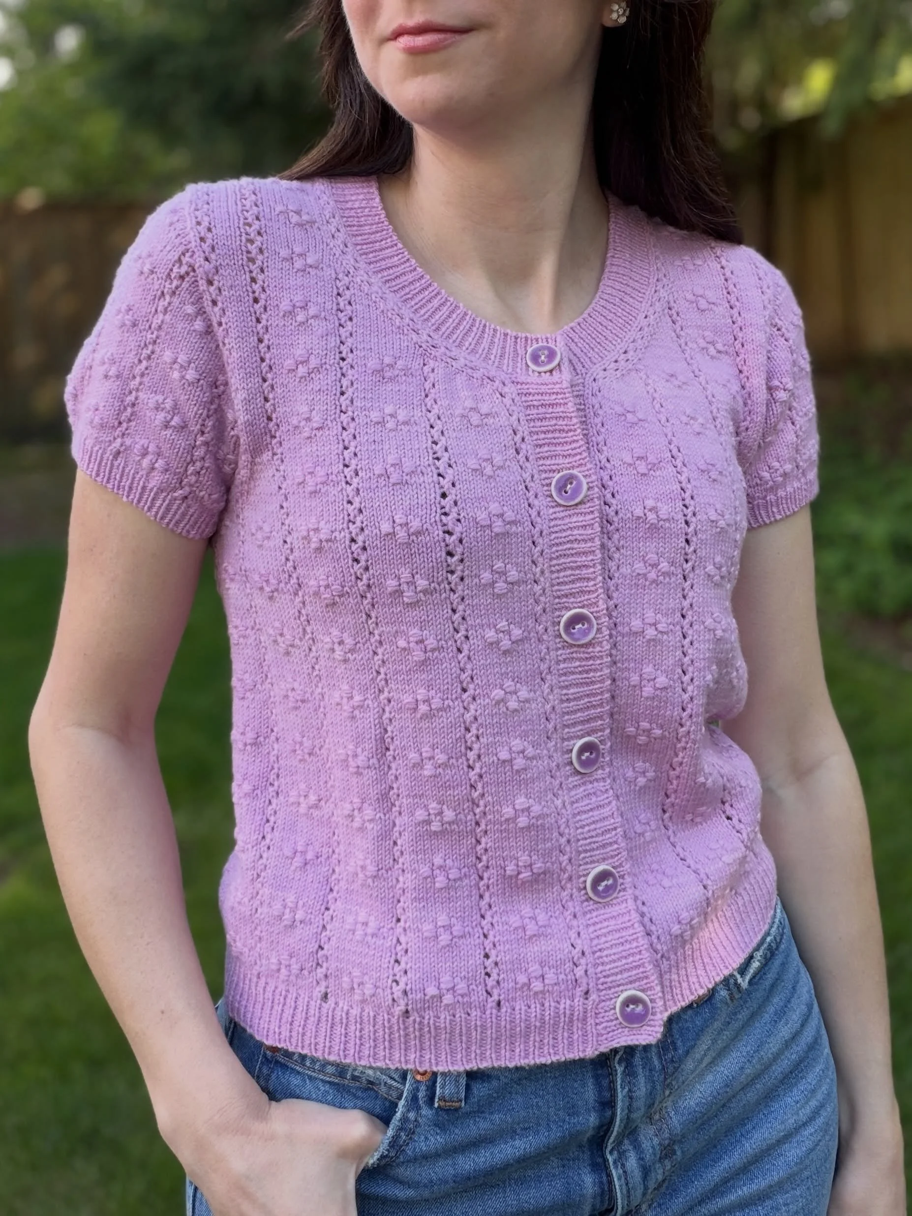 The Ravenna Pattern is ready for testing!

This pattern includes options for short sleeves or long sleeves, and your choice of cardigan (button-down, knit flat) or pullover (no buttons, knit in the round).

The Ravenna pattern comes in 12 sizes, rang