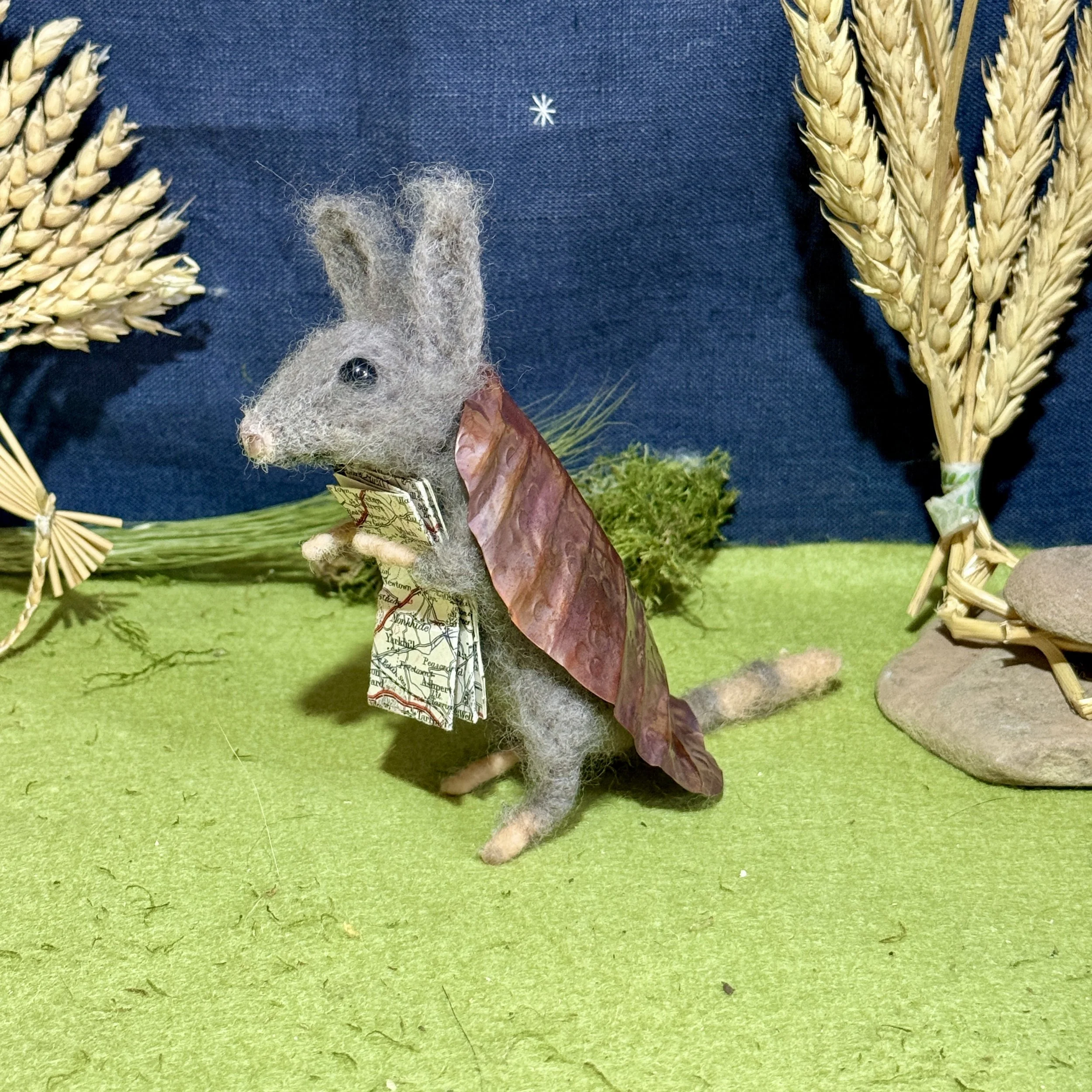 Needle felted armadillo with a copper shell hand hammered into folds and shape. They have a vintage map to help them find all the best chippies and icecream places! Approx 10cm tall, 12 to tips of ears £160
