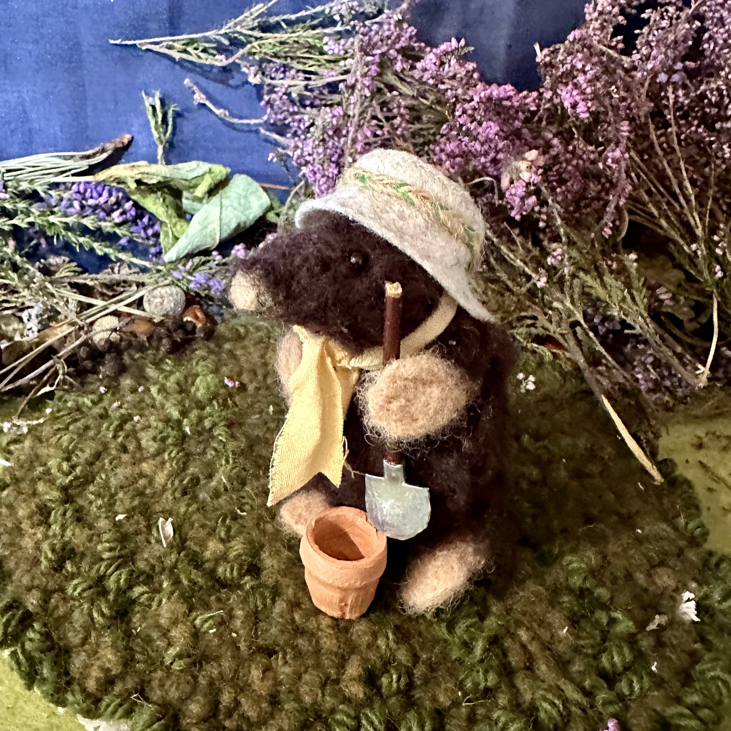 Mole with grey felt hat
