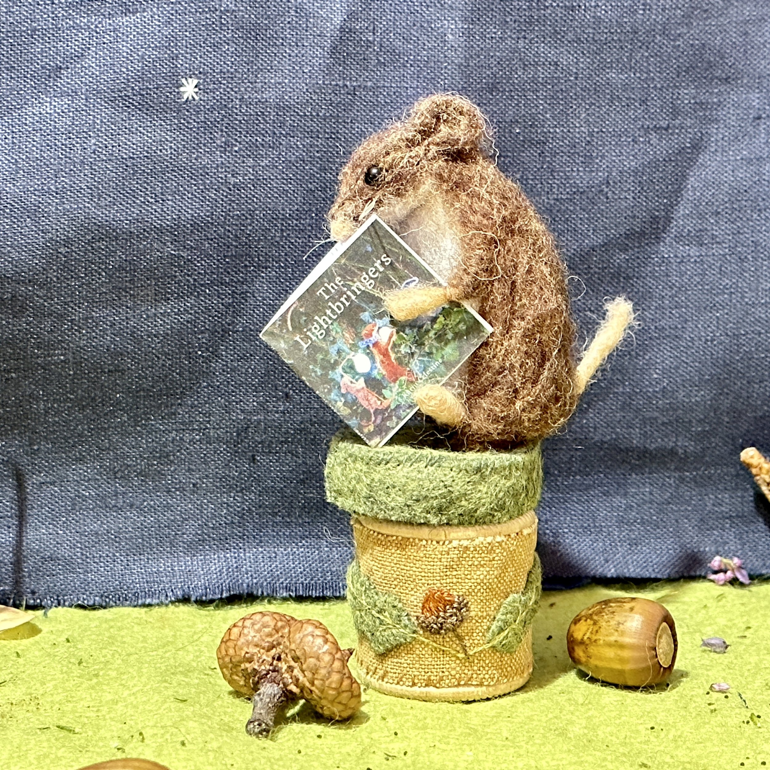 celestine and the hare needle felted mouse reading.jpg