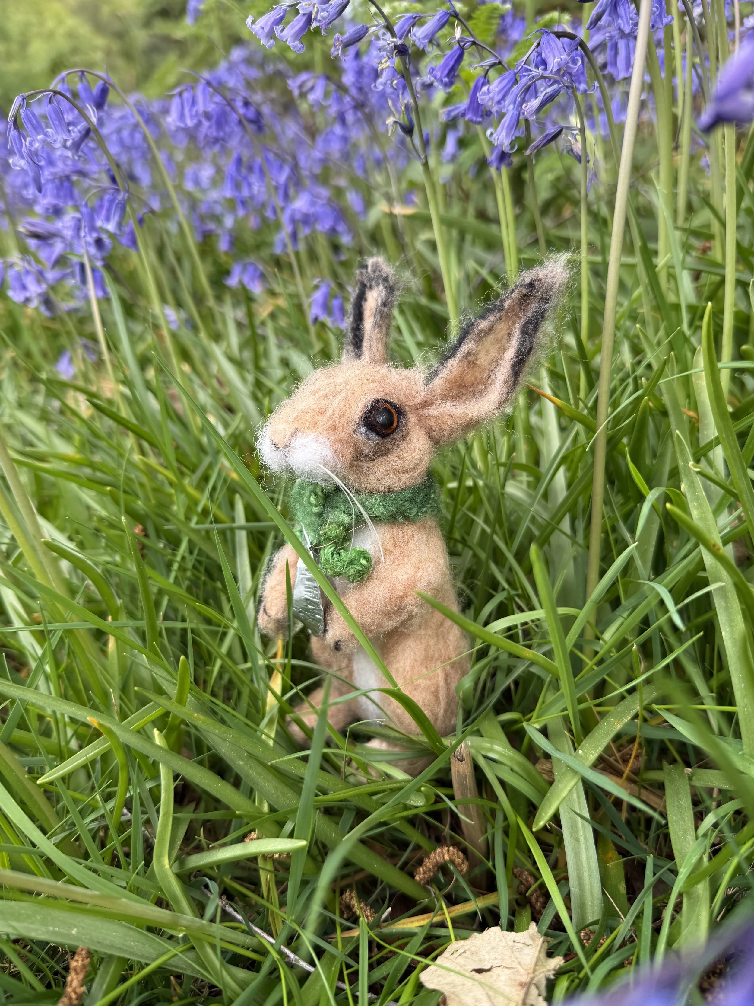 Needle felted hare with a moon. Hare is approx 17cm to tip of ears and has a wool scarf and a fold formed hammered metal moon around their neck. Can be moved and posed as you wish. 