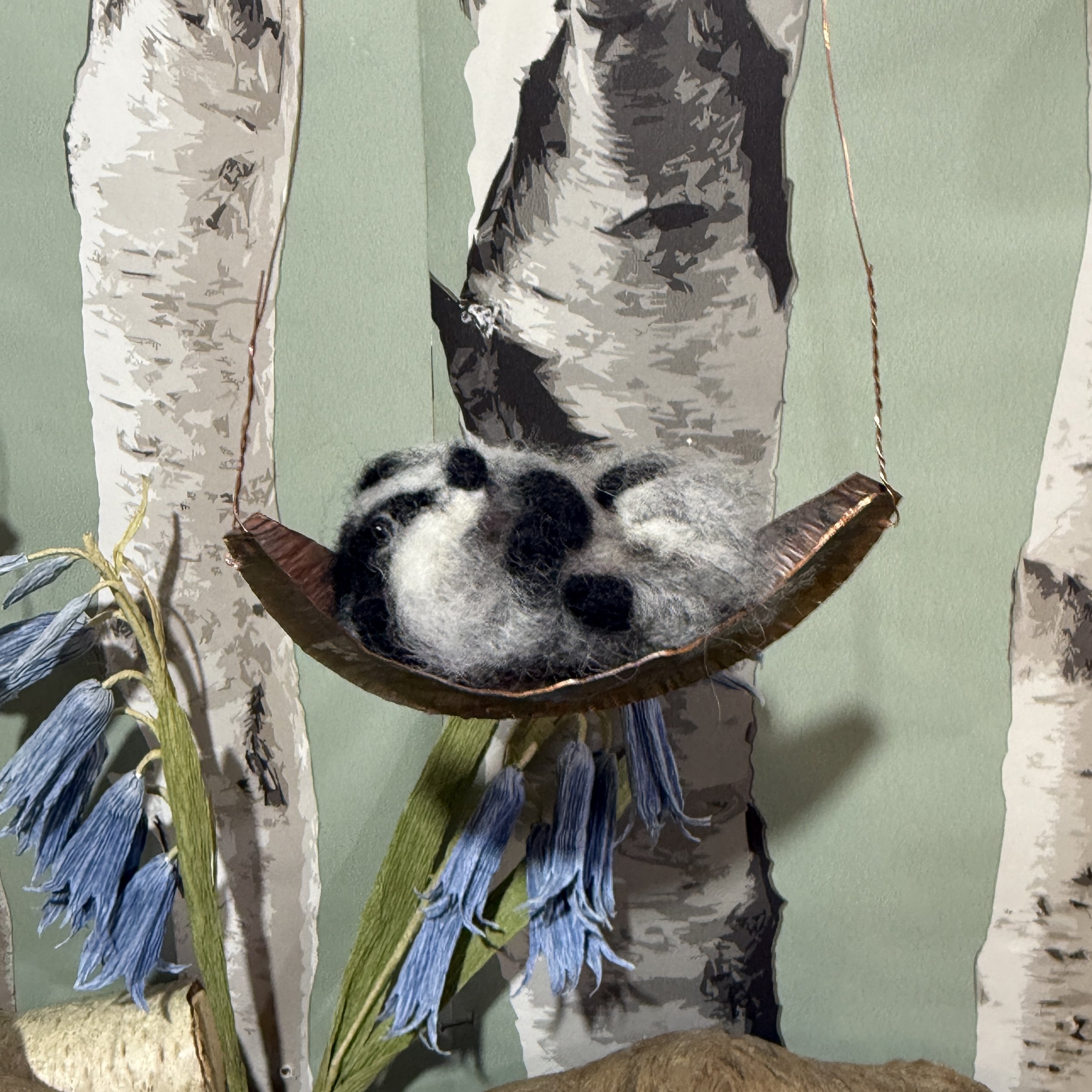 Baby Badger in a copper moon boat crib 
The crib is fold formed hand hammered pure copper  The boat is approx 10cm long badger is 6cm long £135