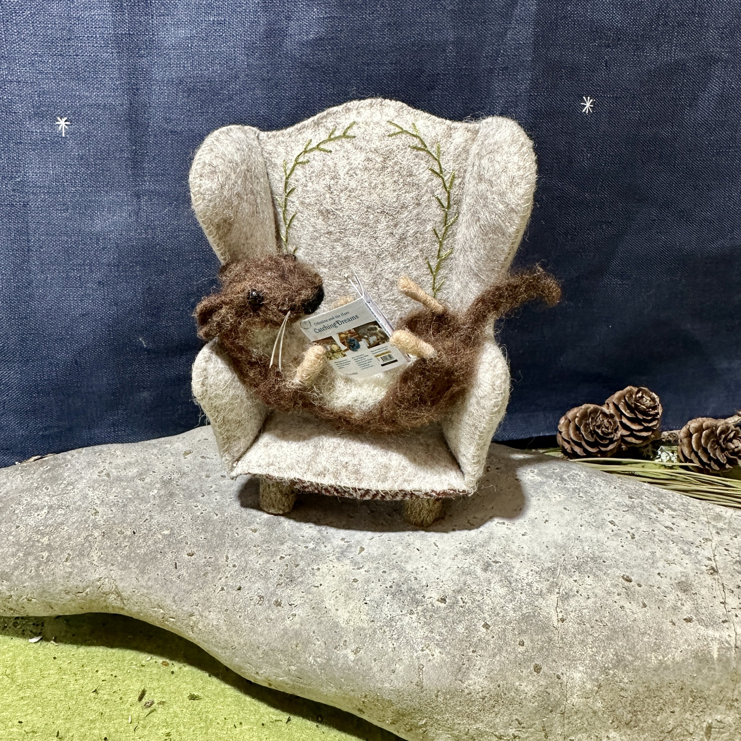 celestine and the hare needle felt weasel armchair.jpg