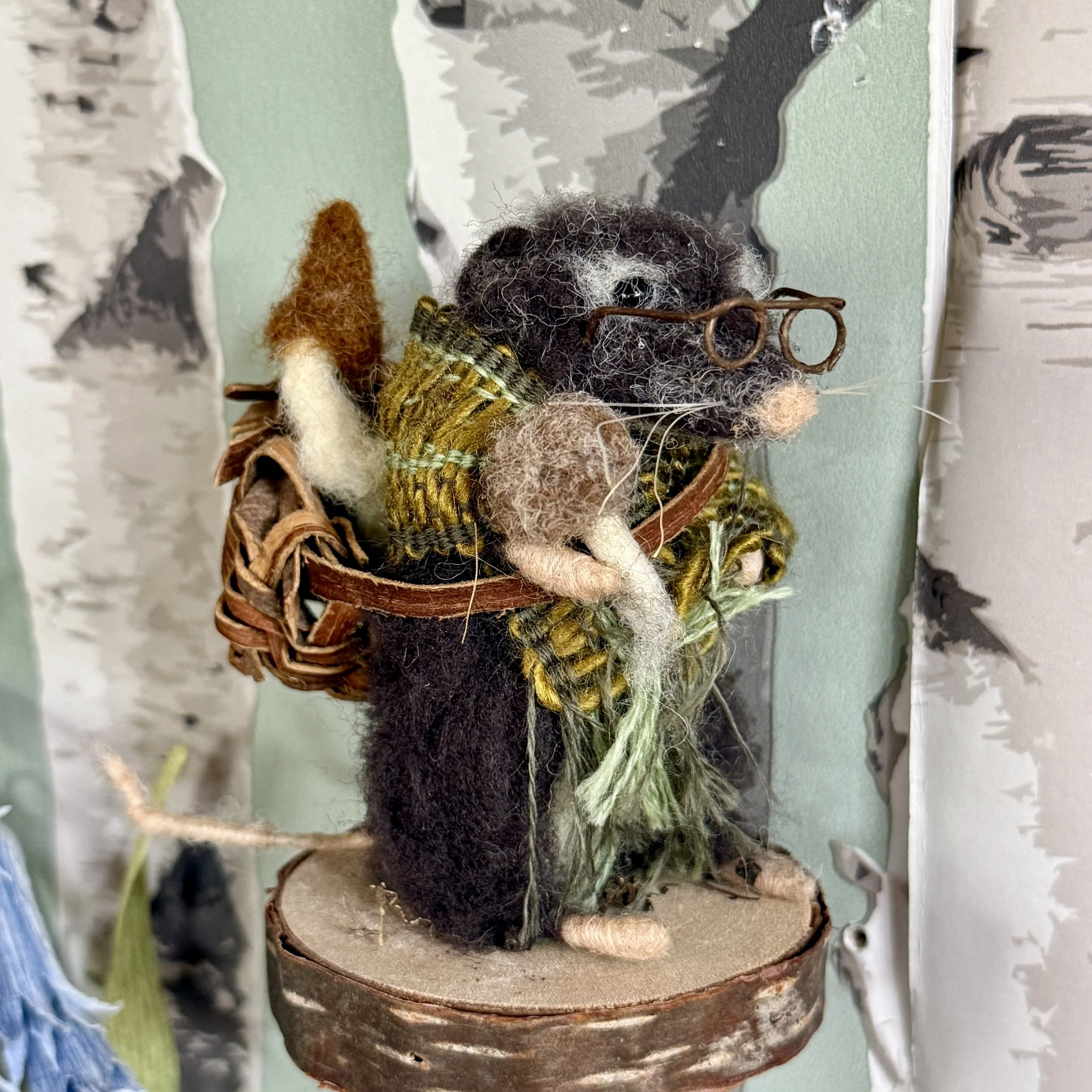 Grandmother shrew from the Gift Gatherers illustration. Felted old shrew with a woven shawl, willow bark basket and felted mushrooms gathered. approx 9cm tall. £155