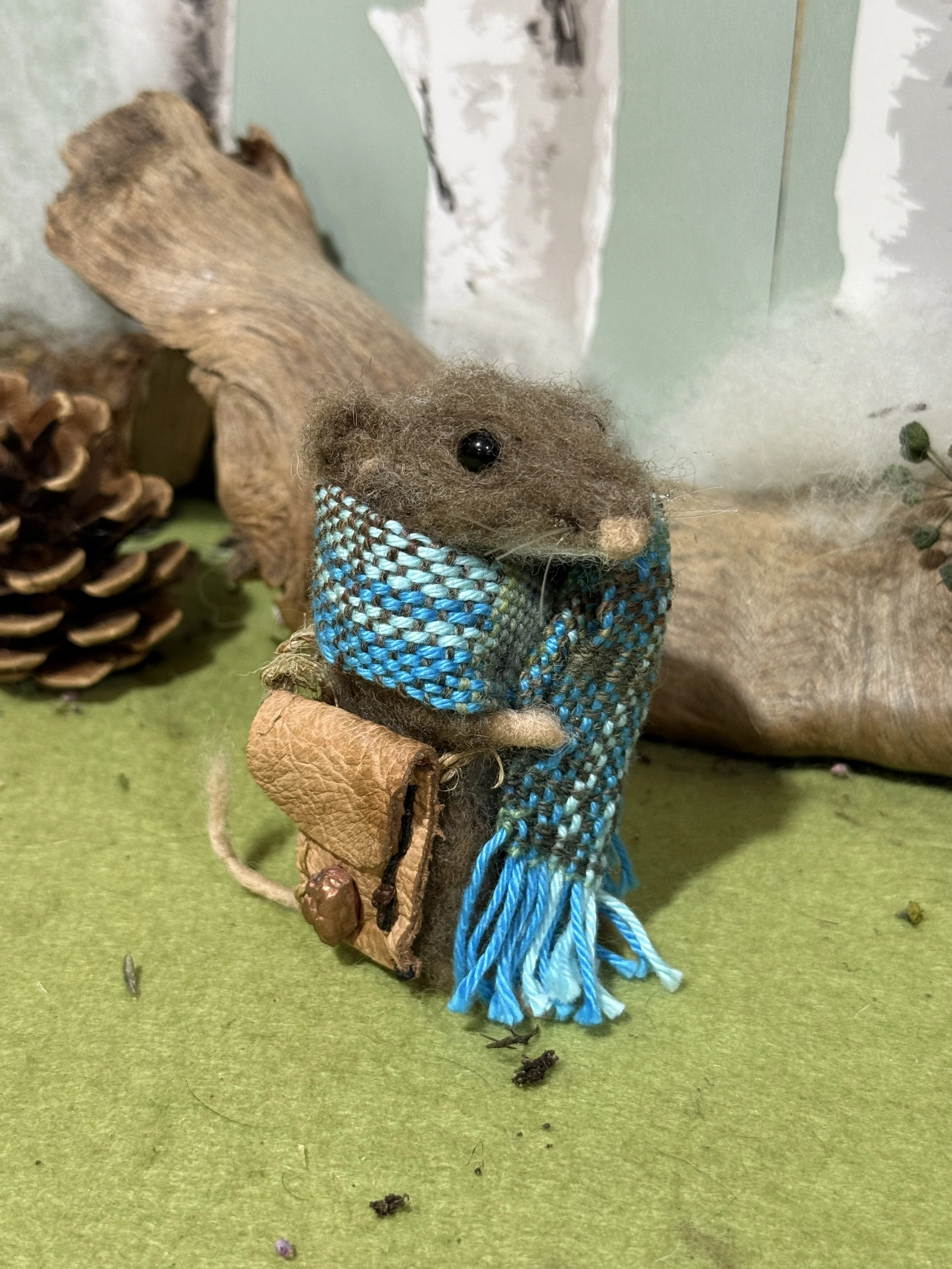 Mouse with a big scarf and leather foraging bag with a copper cast bramble fastening. approx 9cm tall £130