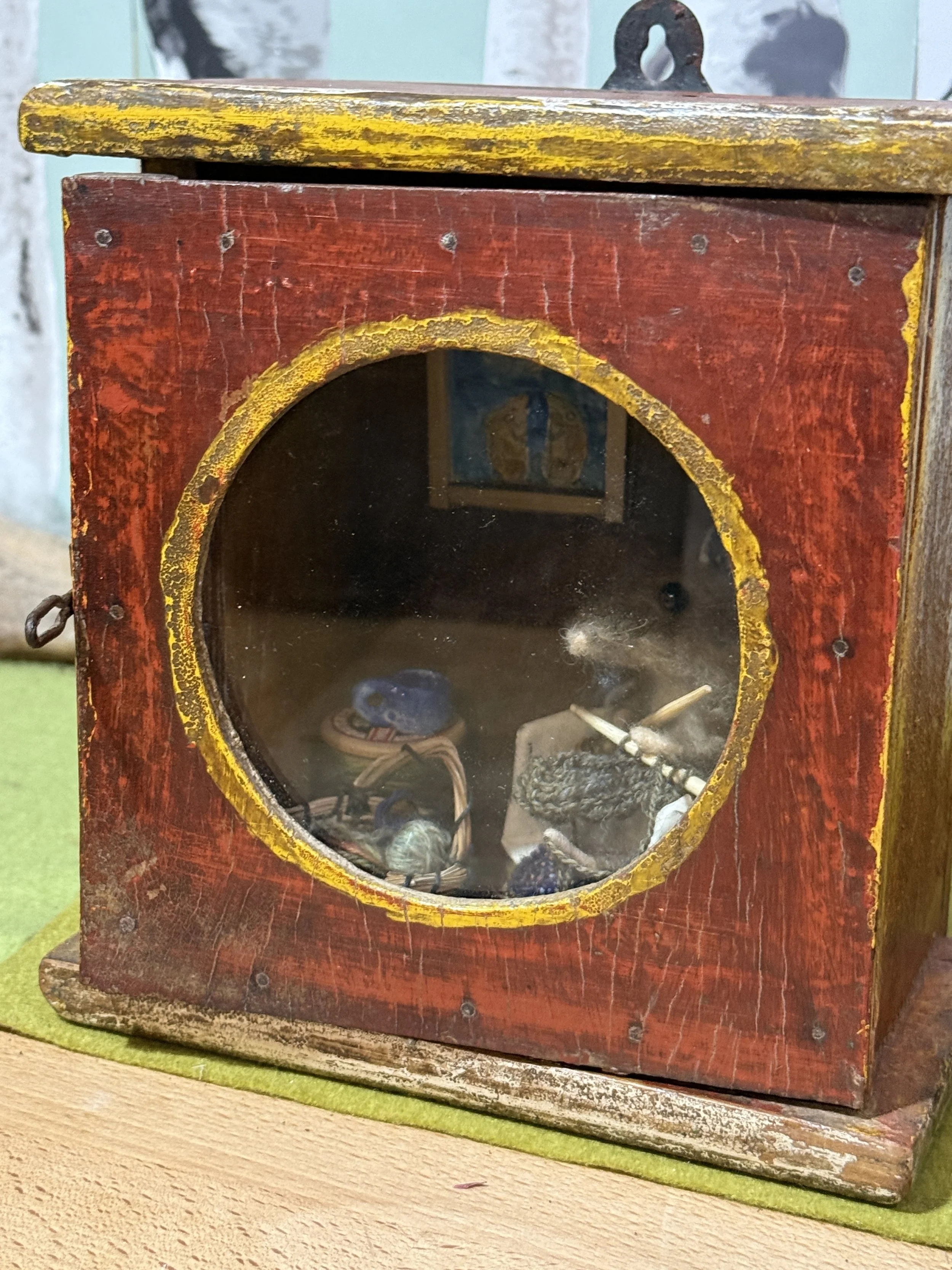 Exterior clock case view Vintage clock case of a mouse knitting in their chair. Not quite finished yet, will take new pic when done. 