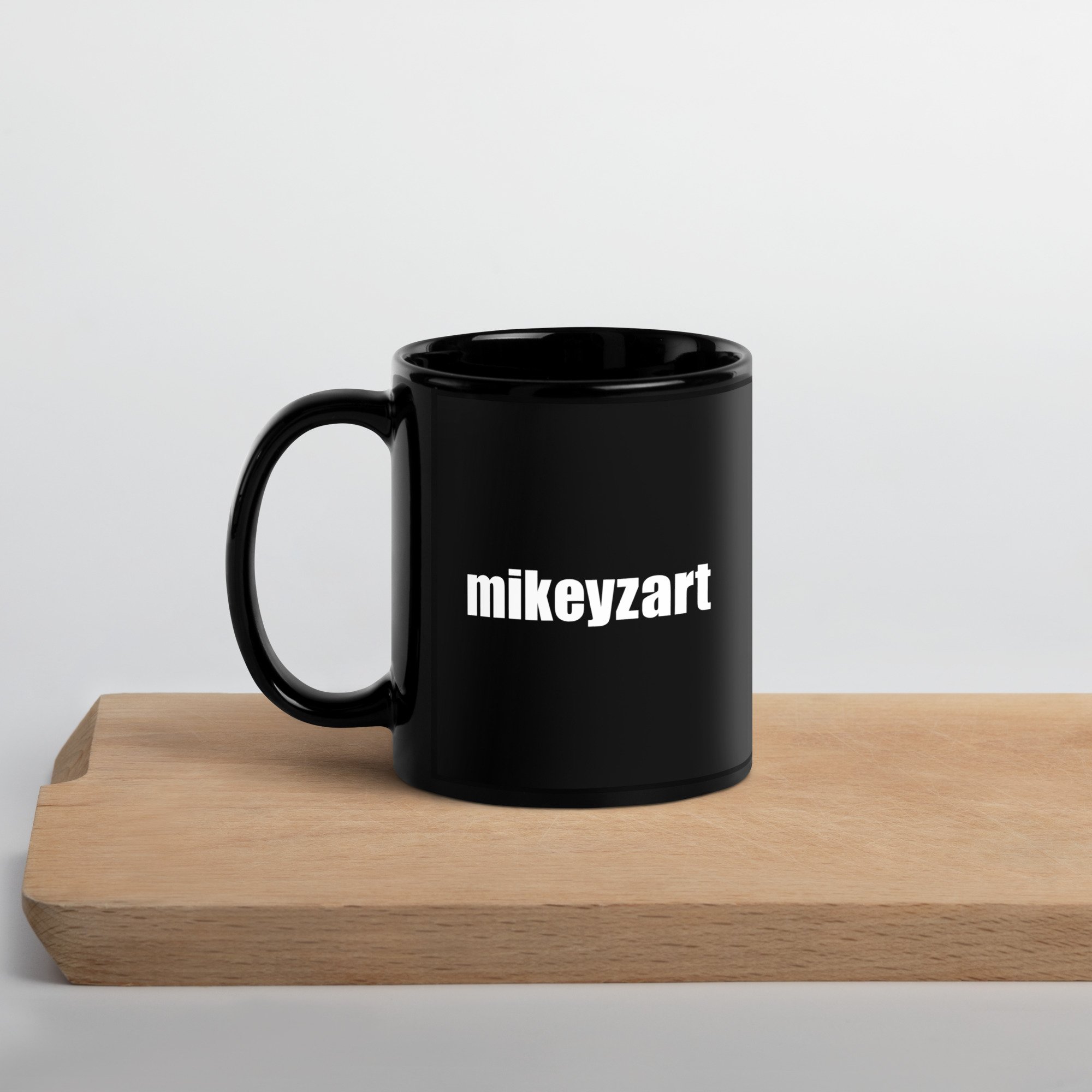 black-glossy-mug-black-11oz-handle-on-left-6459c3d45b71e.jpg