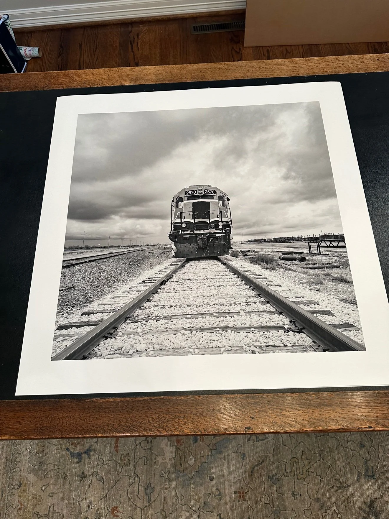 Large loose black and white print of locomotive 2570, in the studio