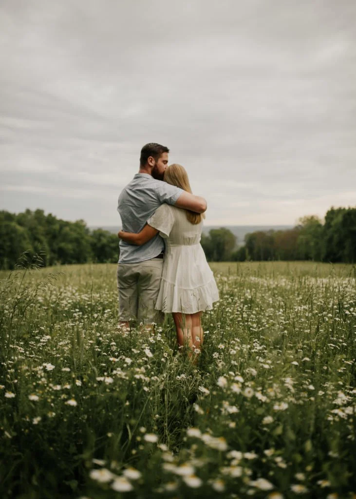 couple-in-flower-field-anniversary.jpg