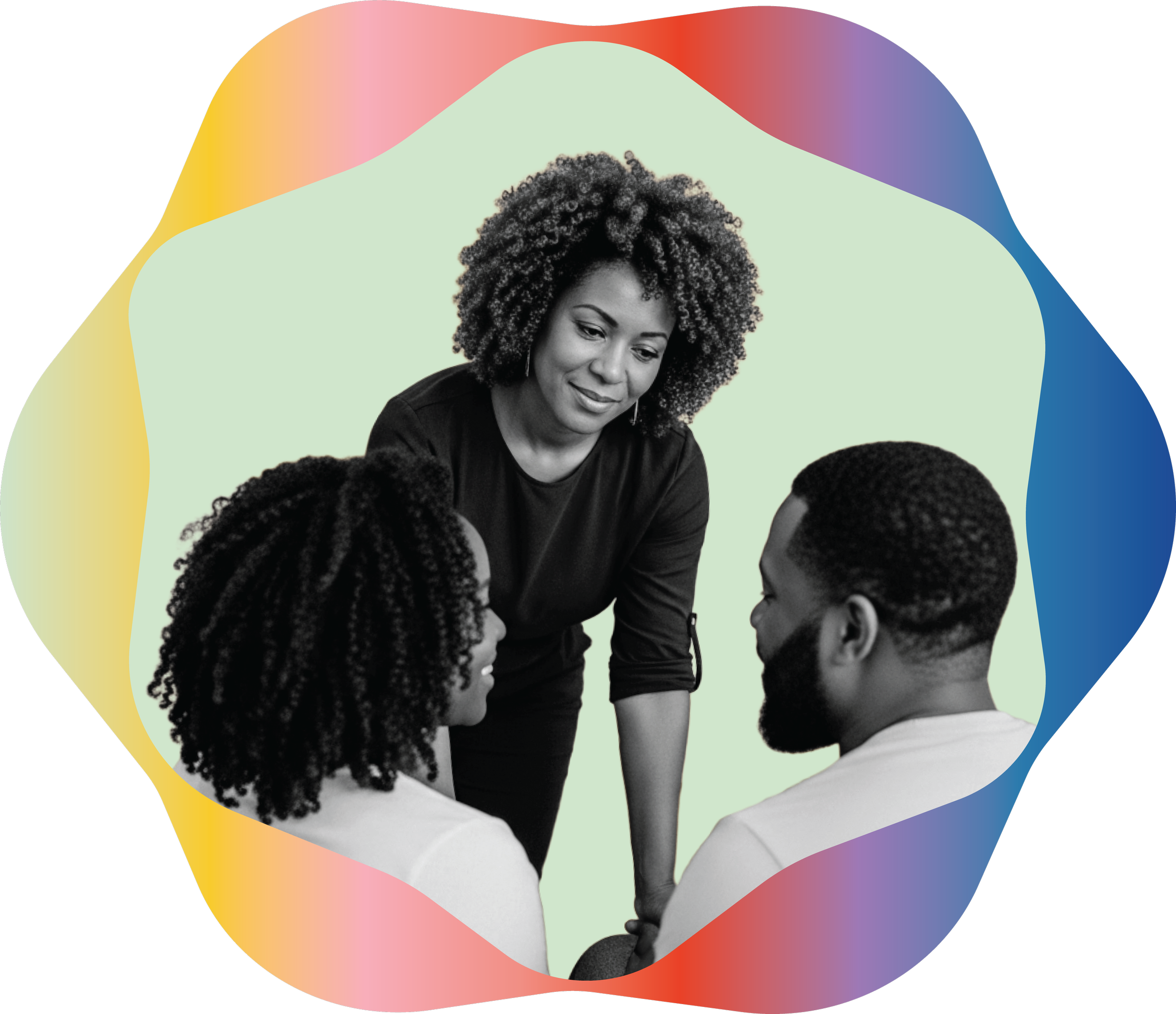 doula facing a smiling couple