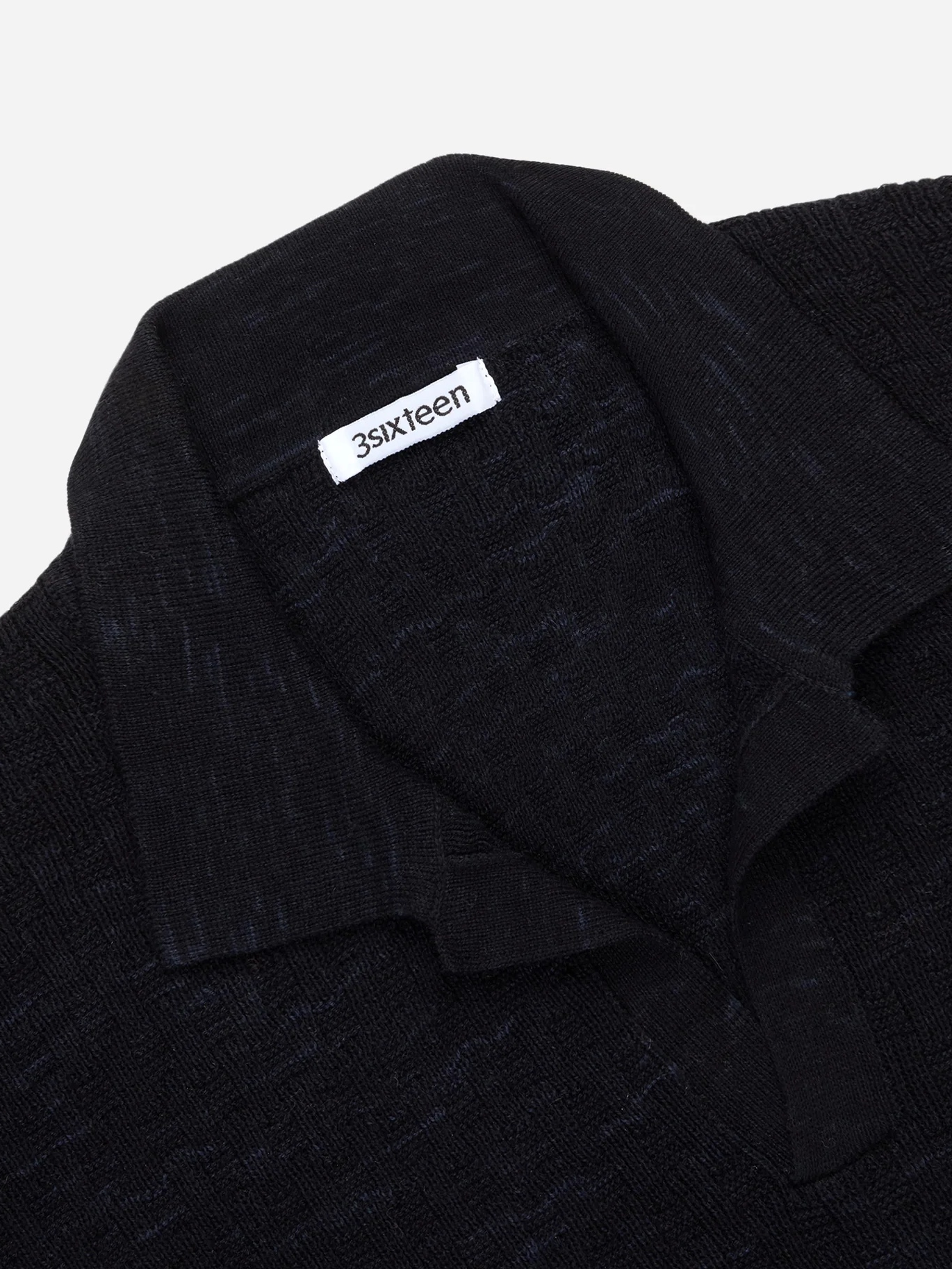 3S_SS26_KNIT_POLO-VINTAGE_BLACK_BOXWEAVE_D1.jpg_clipped_rev_1.png