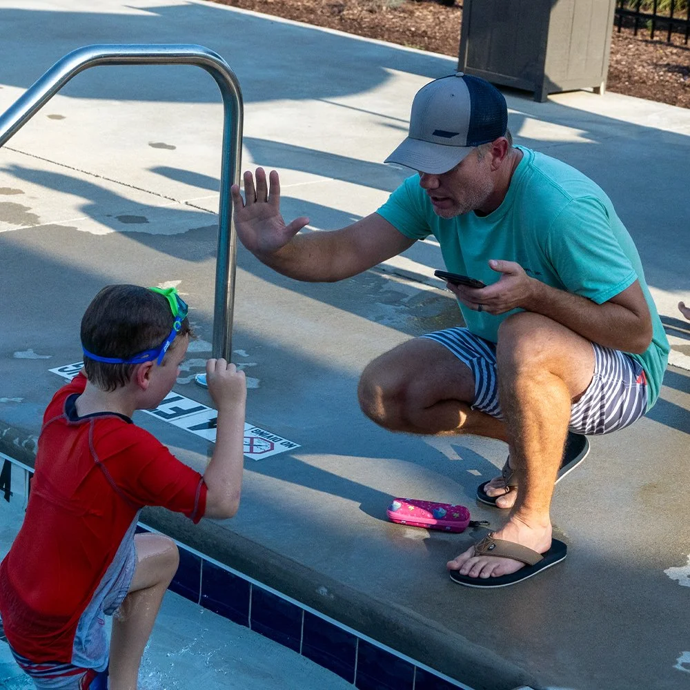 Father and Son. The Grove Tsunami swim team.
