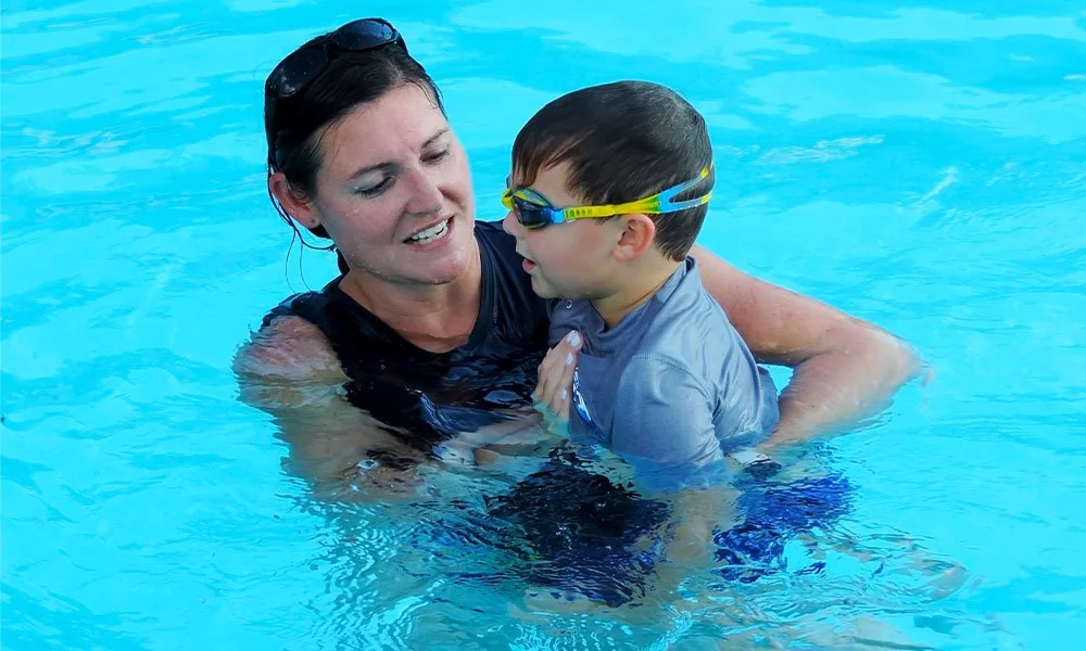 Private swim lessons at The Grove Club pool for residents
