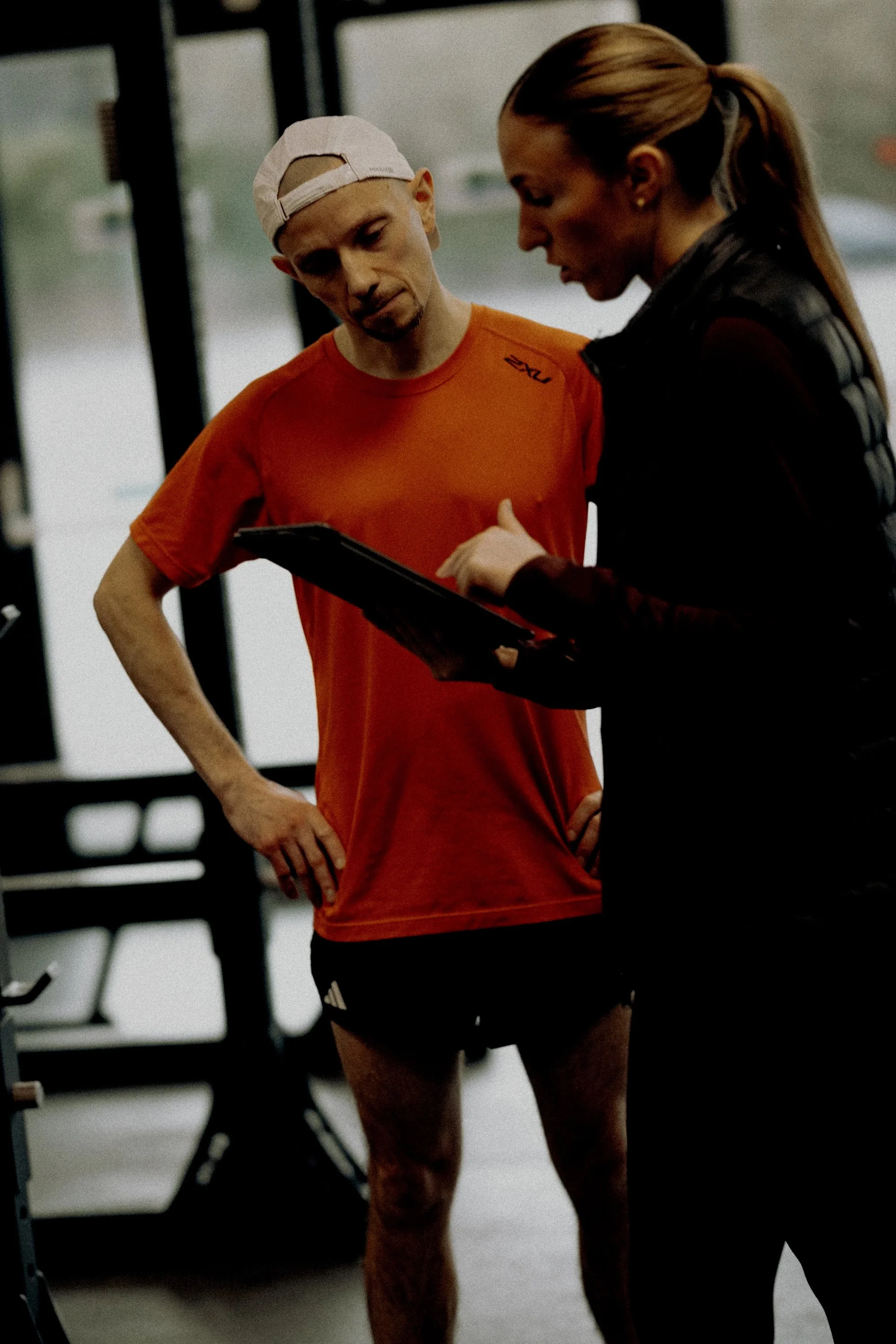 Coach Morgan helping athlete choose a training plan