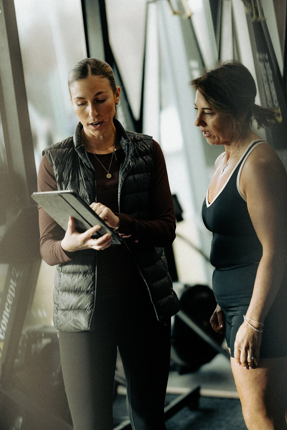 An HP3 coach going through a training plan with an athlete