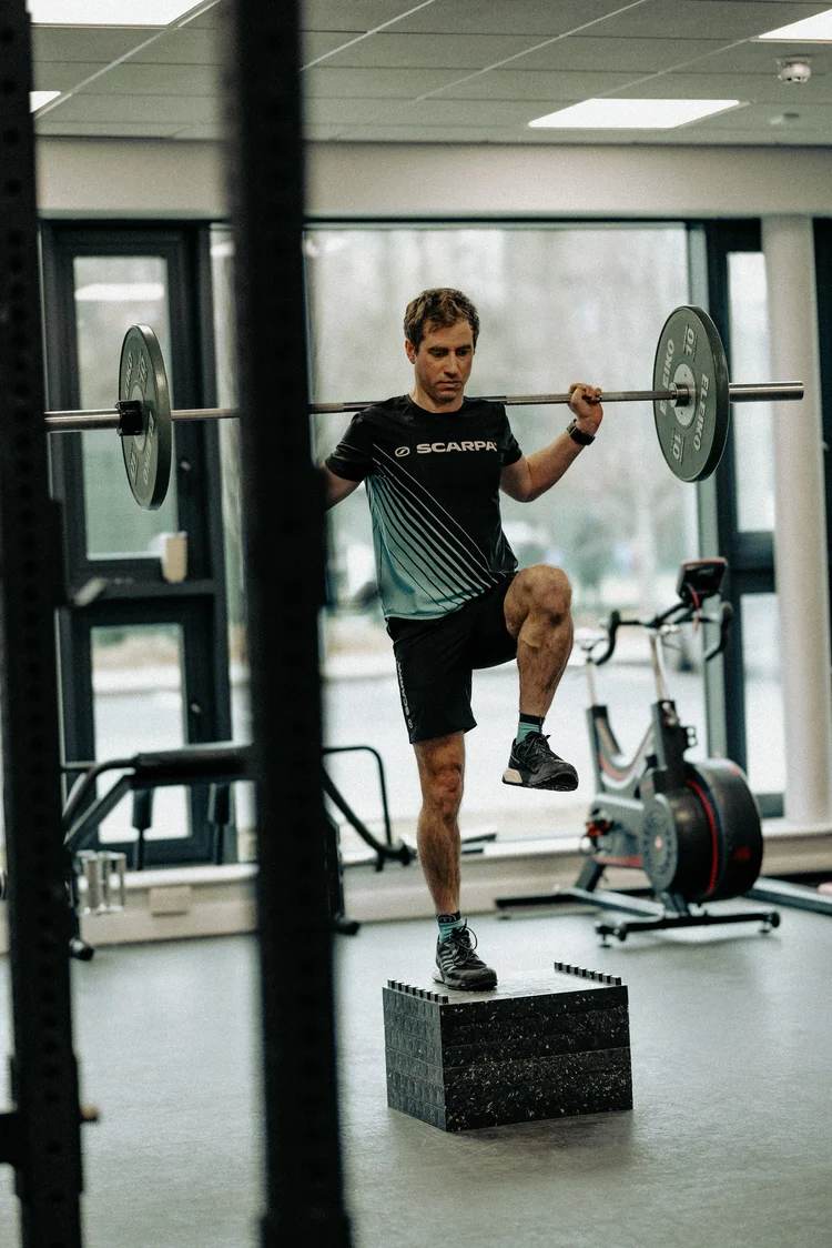 Tim coaching a strength session in the gym