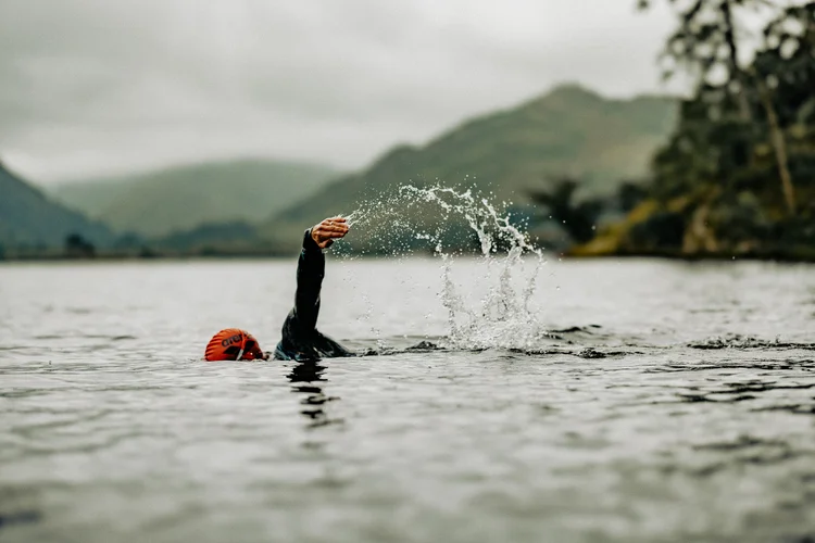 Tim swimming in open water