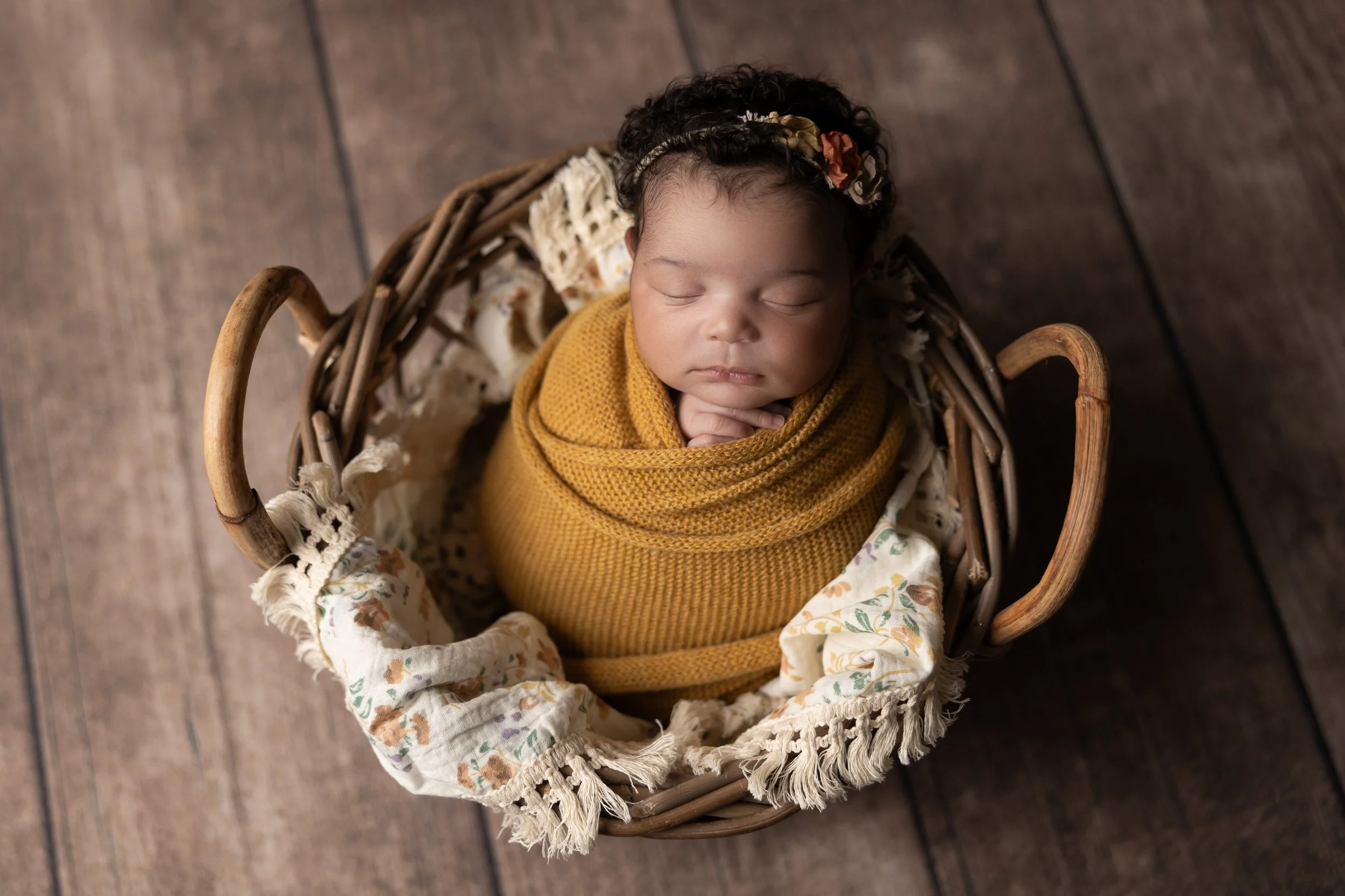 austin-newborn-studio-phtographer-baby-mustard-wrap-basket-prop-studio.jpg